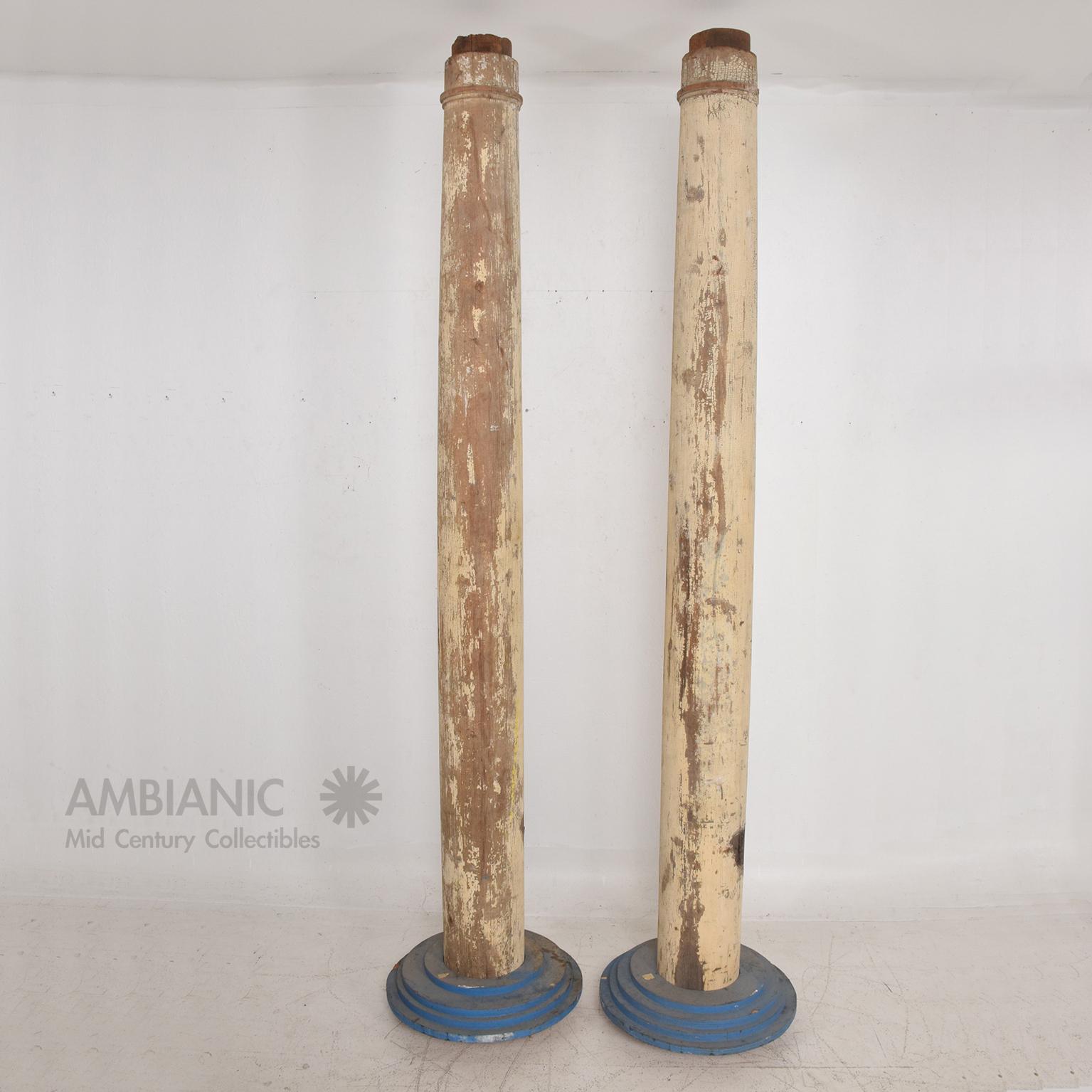 1930s Vintage Architectural Modern Wood Columns set of 4
Distressed condition includes original paint and patina. 
Tall: 88.5 H x 7.5 diameter, Base 18 diameter,
Short: 53 x 5.75 diameter, 15.75 diameter.
Original Unrestored distressed Vintage
