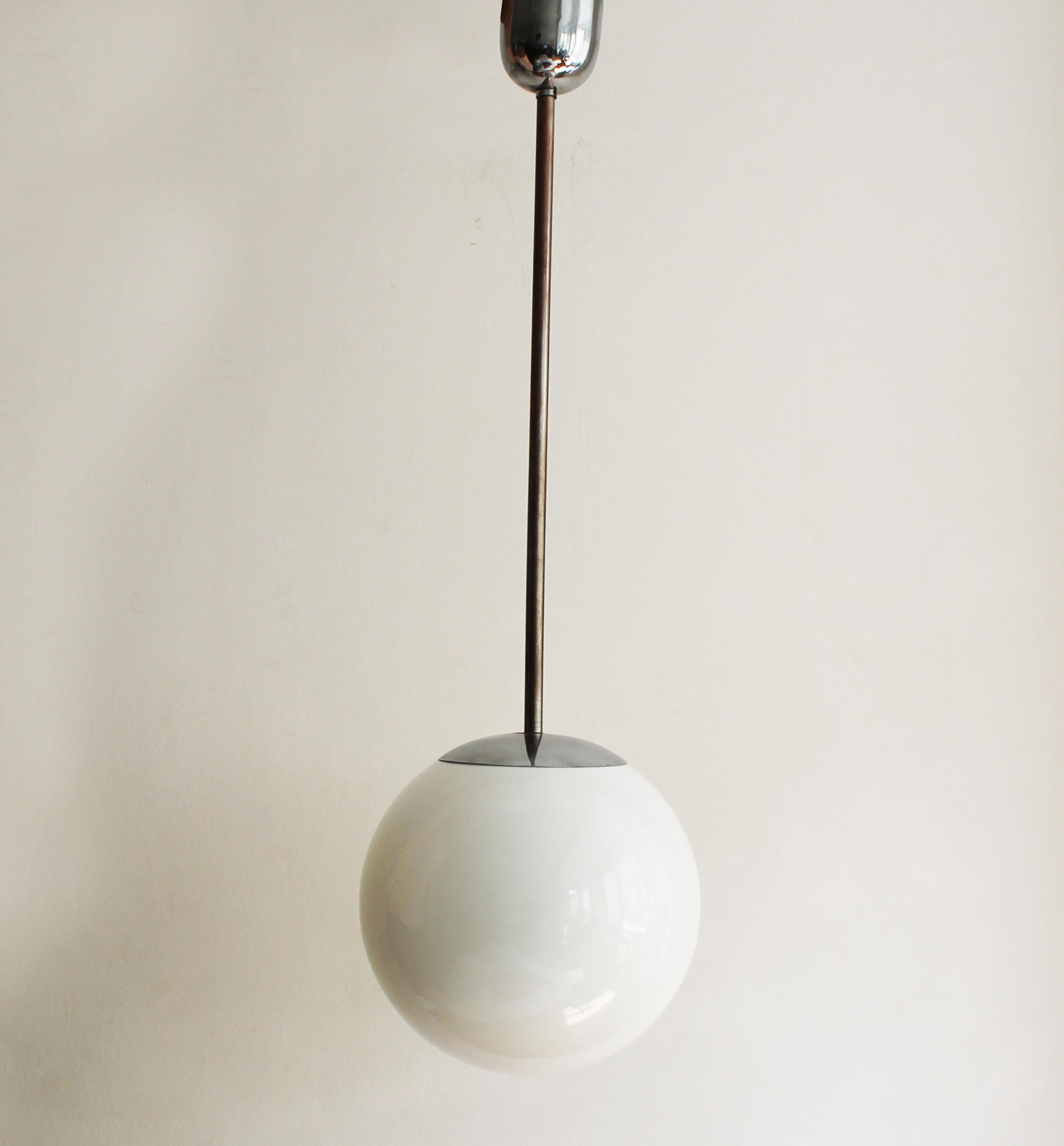 This is an original ceiling lamp made in the 1930s by Franta Anyz Co., and is believed to be designed by Jaroslav Anyz.

Franta Anyz was a leading Czech designer and jeweller. He was also a founder of a large metalworking factory in Prague at the