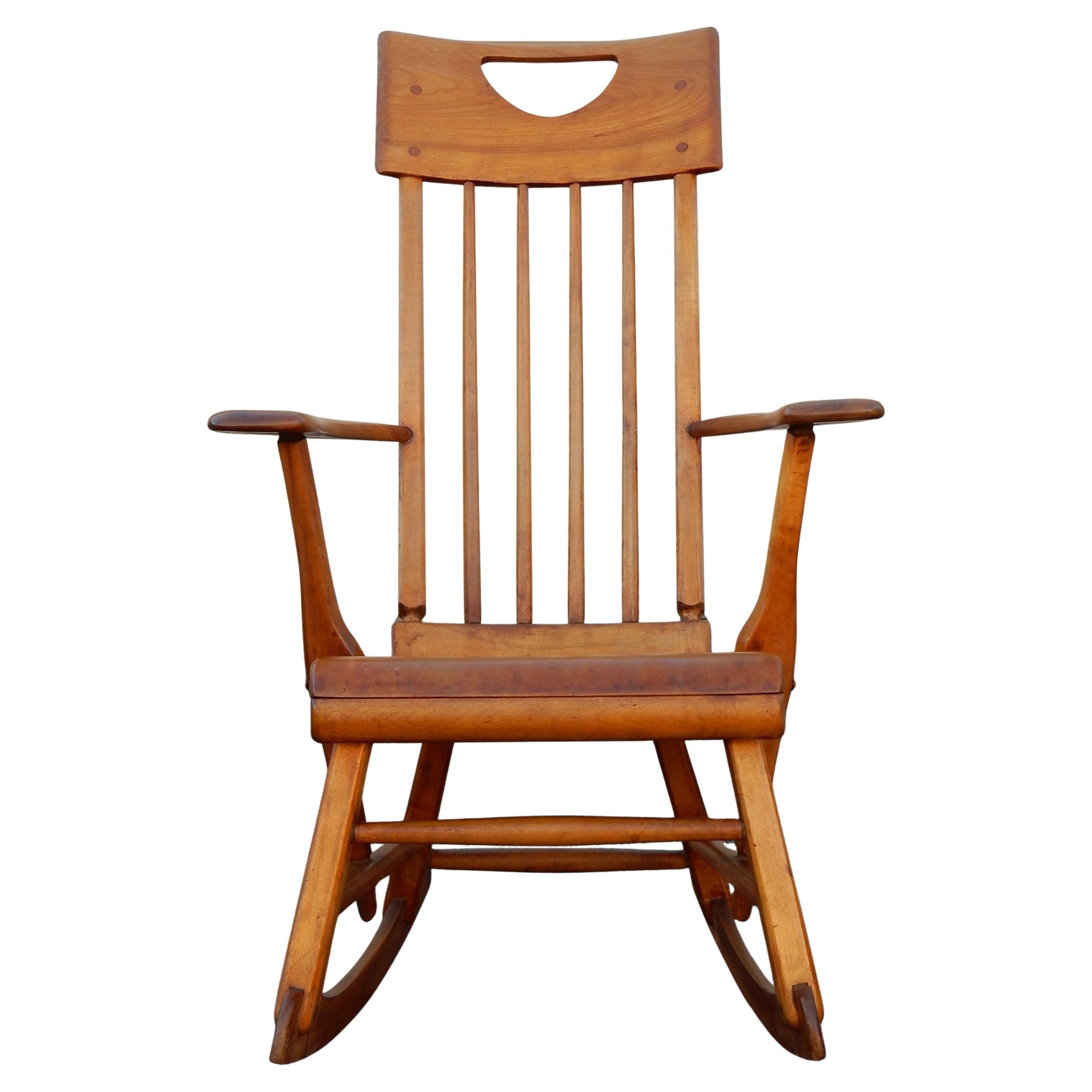 Modernist rocking chair from the 1930's by designer Herman De Vries for Sikes Furniture Company of Buffalo.
Gorgeous Maplewood construction joined with dowels.
Completely original and well cared for condition. 
Purchased from the original owner's
