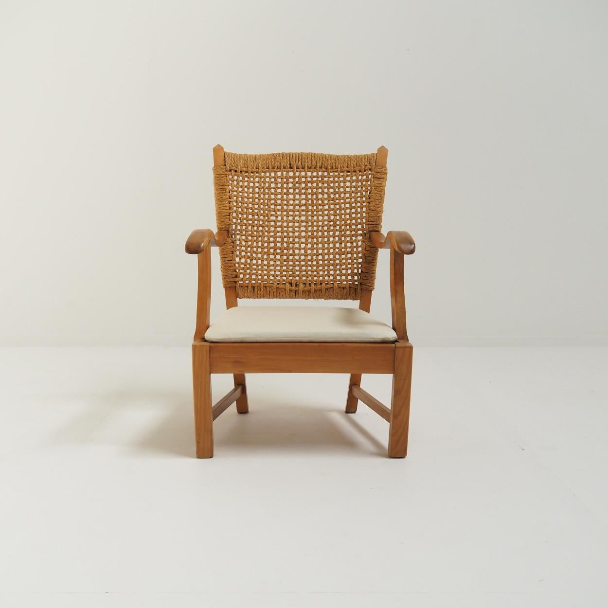 Typical 1930s modernist chair attributed to Dutch designer Bas van Pelt, most likely produced in the 1940s or 1950s.

The chair is in very good condition, where all the woodwork has been completely checked and refinished. The seat cushion has also