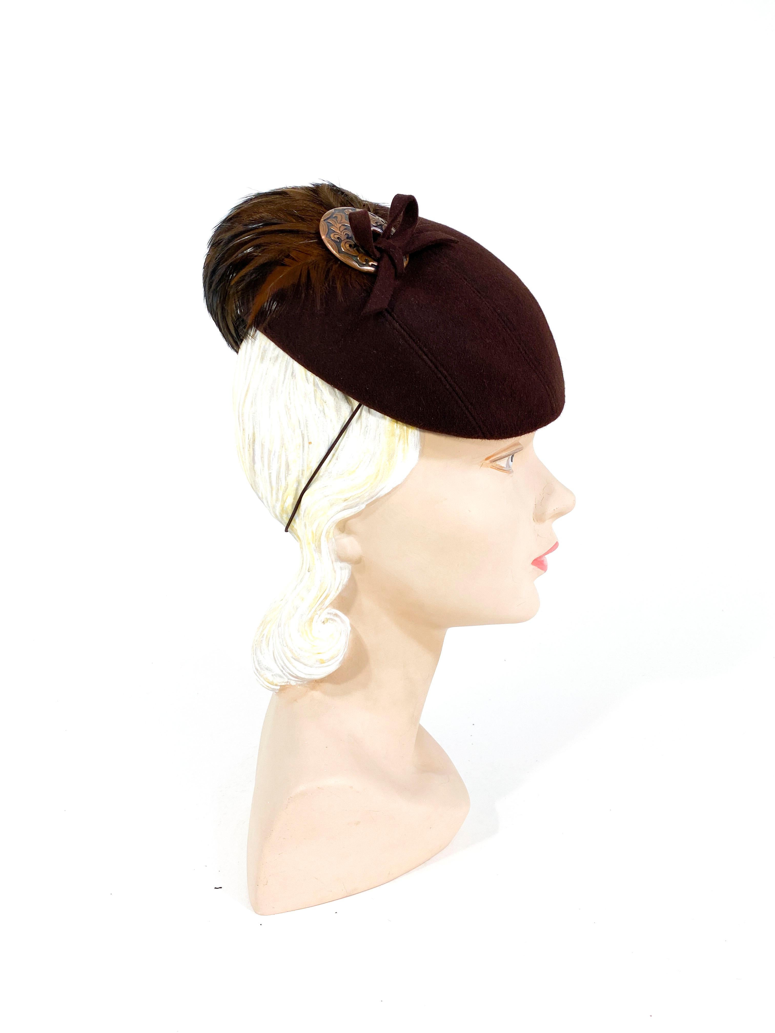 beret with feather