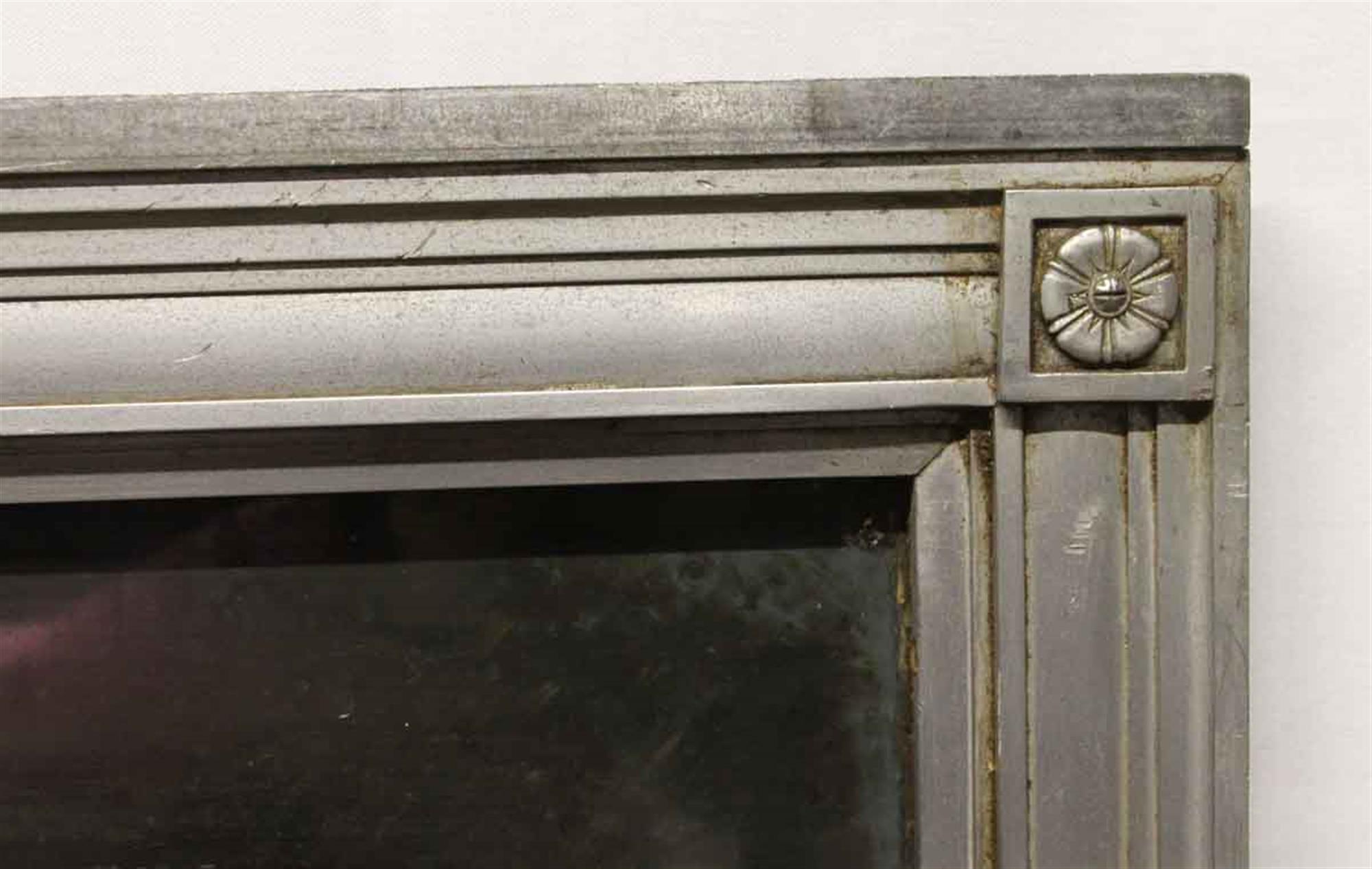 American 1930s Nickel Framed Distressed Mirror with Floret Details on Corners