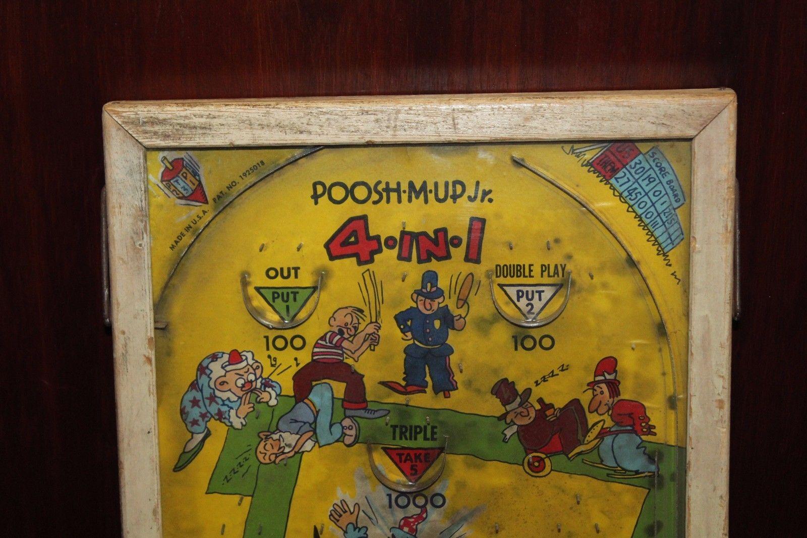 This vintage pinball game was made by the Northwestern Products Co., St Louis, MO in the 1930s-1940s. The back is a cartoon of a baseball game with ten silver tone balls, a wooden spring loaded plunger, bumpers, a wooden frame and a glass top. A
