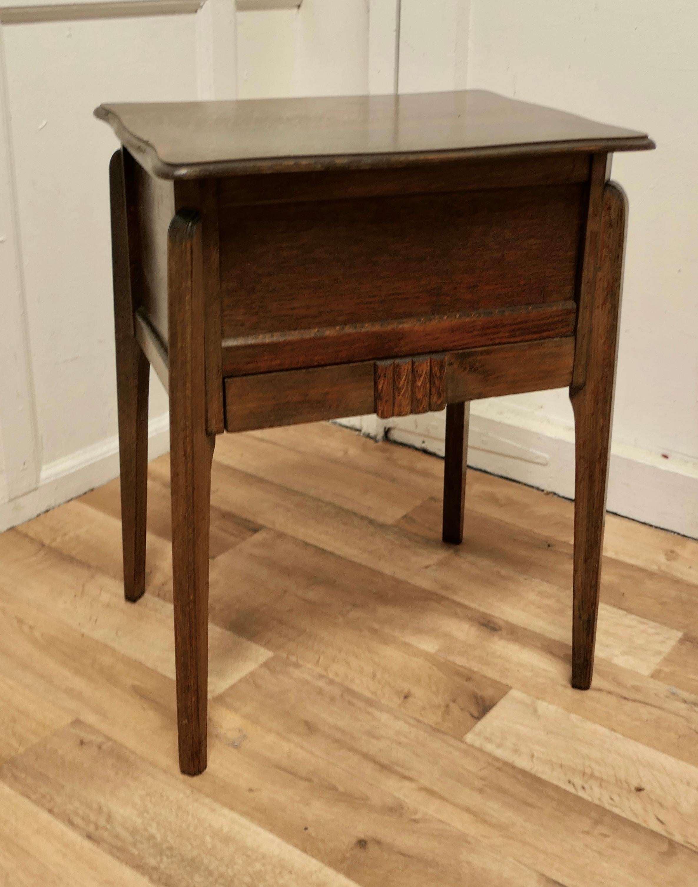 1930s Oak sewing box table by Morco

This is a good sturdy side table, with a good colour, just open the top to find a pleated yellow lining and a pin cushion in the lid with and a drawer for reels of thread underneath all in good condition for