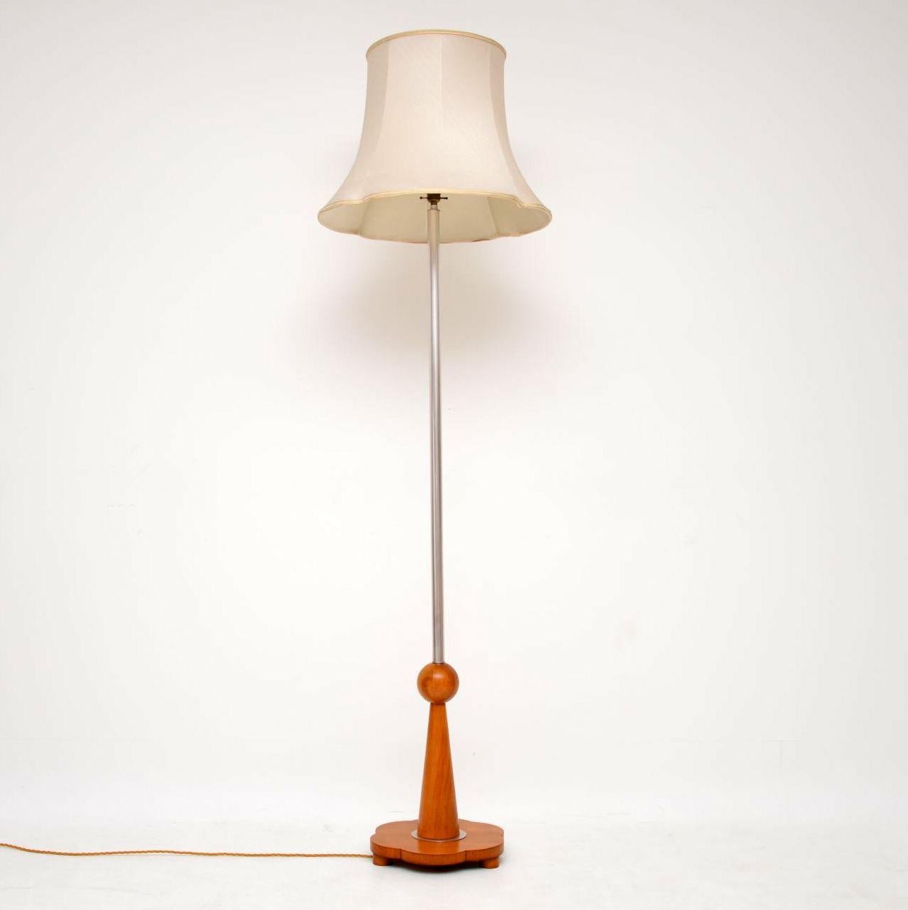 A beautiful original art deco period floor lamp with a satin wood base and stainless steel frame. We have had the wood stripped and re-polished, this has been re-wired and is in good working order. The shade has some minor wear, overall the