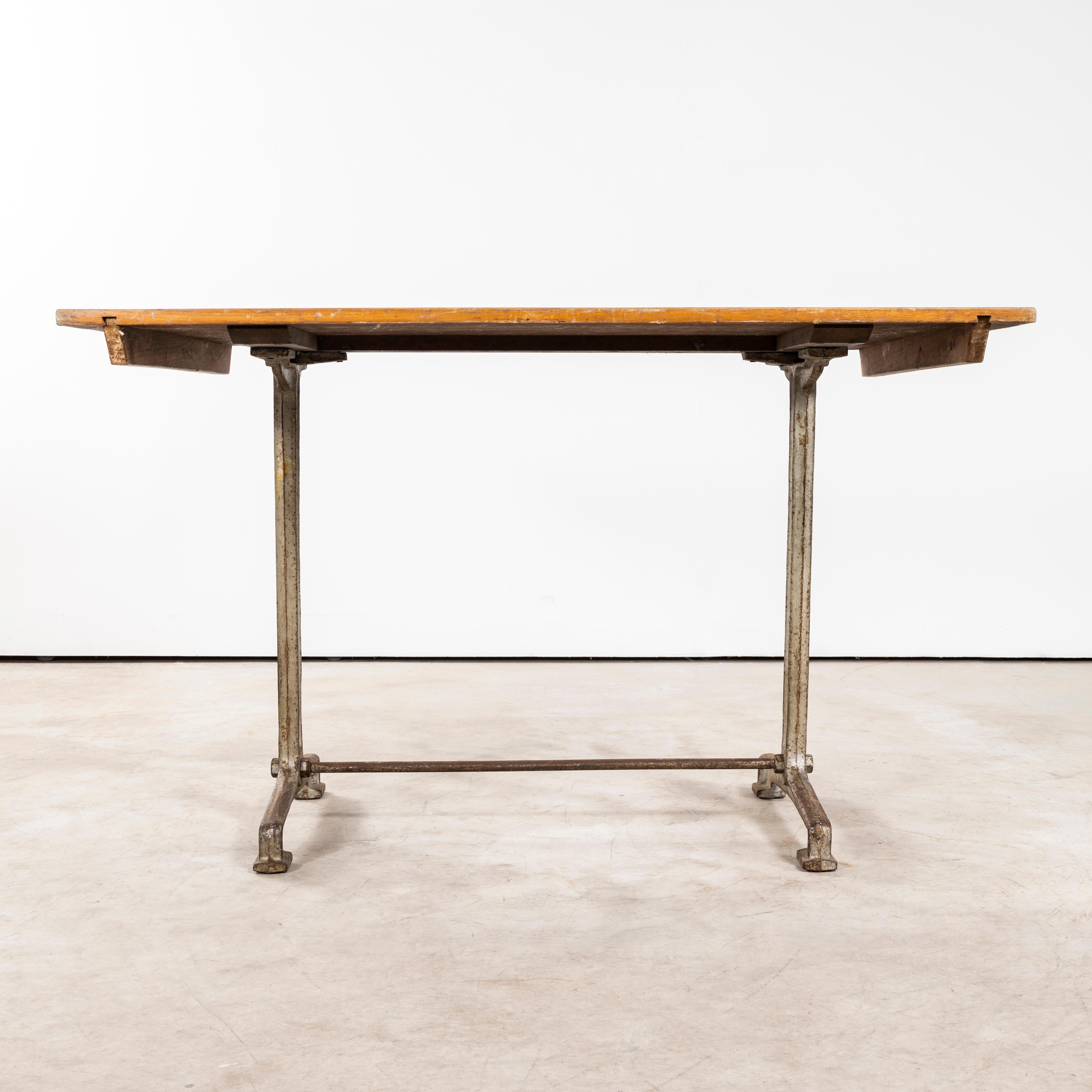 1930's Original Cast Base Fischel Bistro Dining Table. 

Fischel was founded in 1871 by Czech born David Gabriel Fischel, a successful vegetable oil merchant, using the first hand knowledge of his eldest son who had worked in one of Thonets Czech
