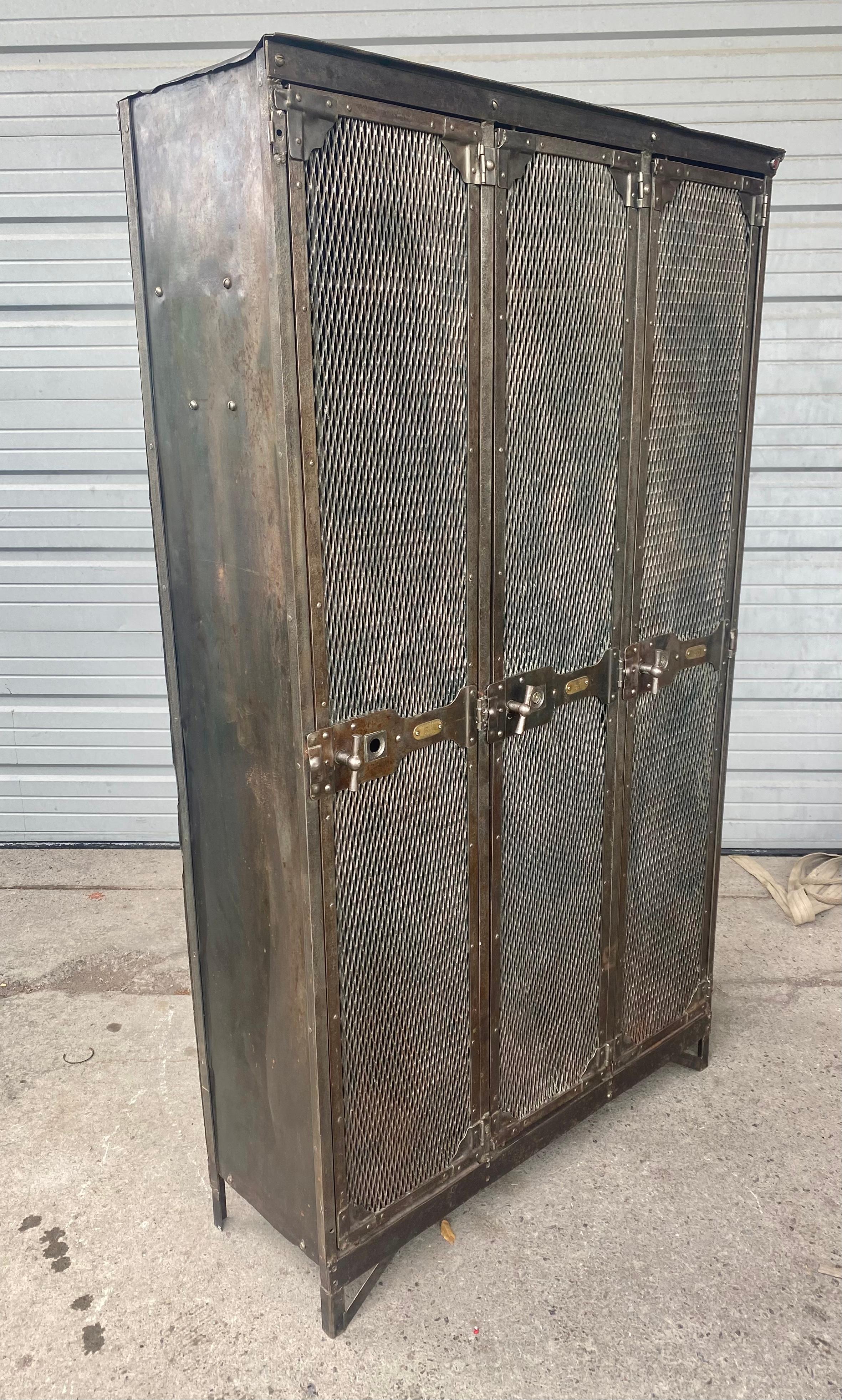 1930’s Original French style metal four door mesh INDUSTRIAL locker by Narragansett.
The company was renowned for its work in perforated steel which was widely used in industrial lockers. This locker is one of the finest we have seen in the most