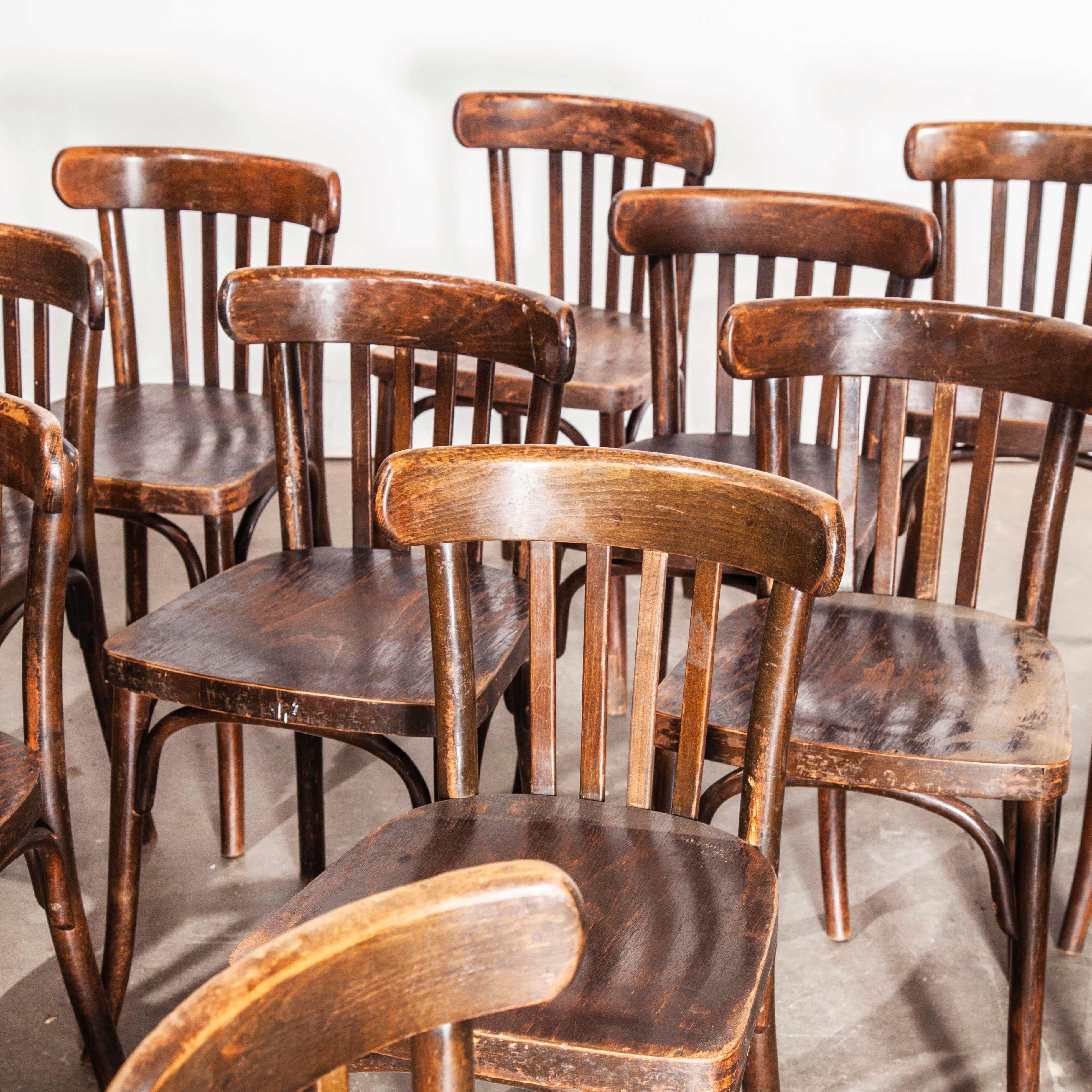 1930s original marked Thonet bentwood dining chairs, dark stained beech, set of twelve
Set of twelve 1930s original marked Thonet bentwood dining chairs, dark stained beech. These chairs are one of our favourite finds this year from an abandoned