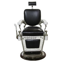 1930s Paider Barber Chair with Black Leather Upholstery and White Porcelain