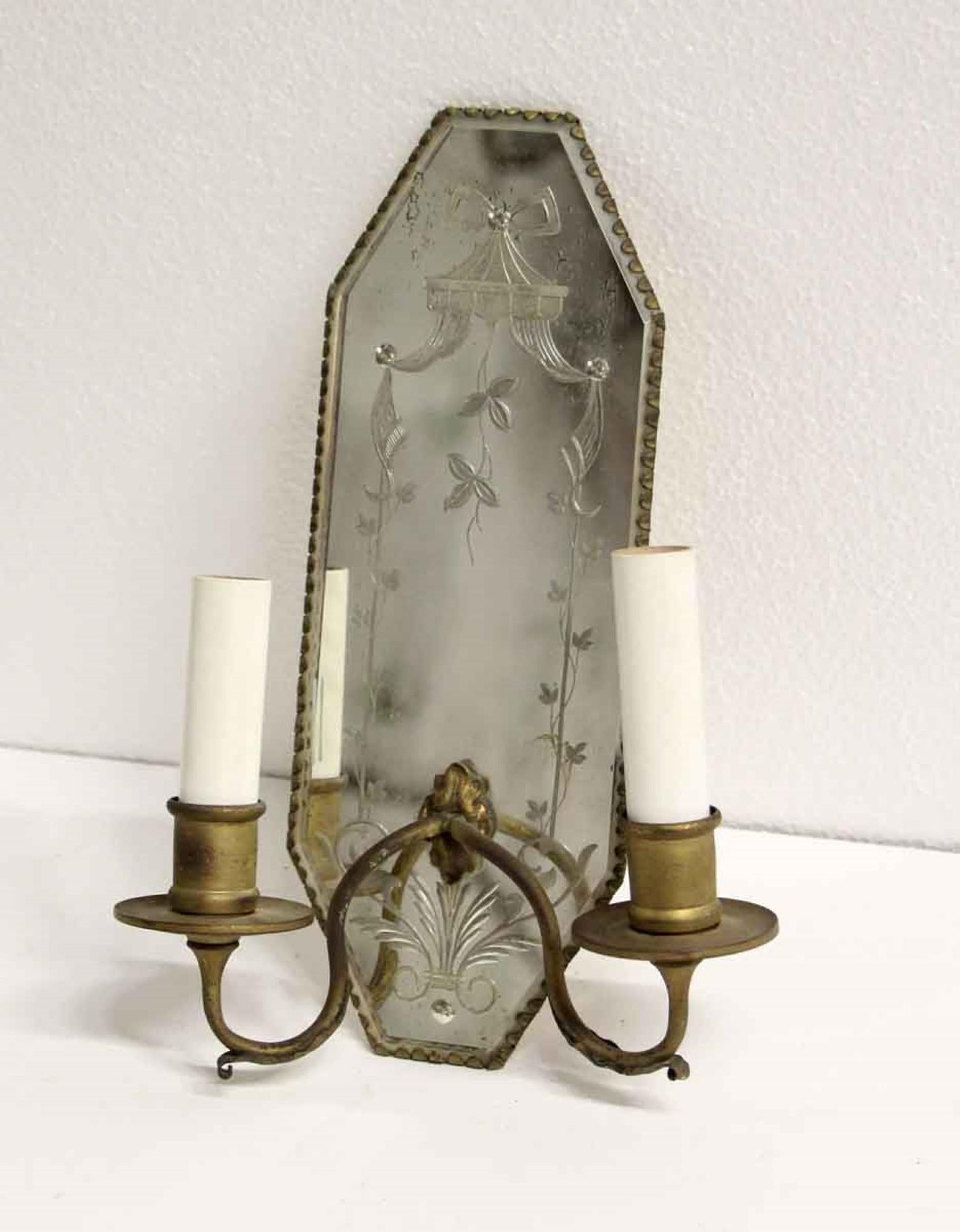 1930s brass French sconces featuring etched mirrored back plates. Two arms each. This can be seen at our 400 Gilligan St location in Scranton, PA.