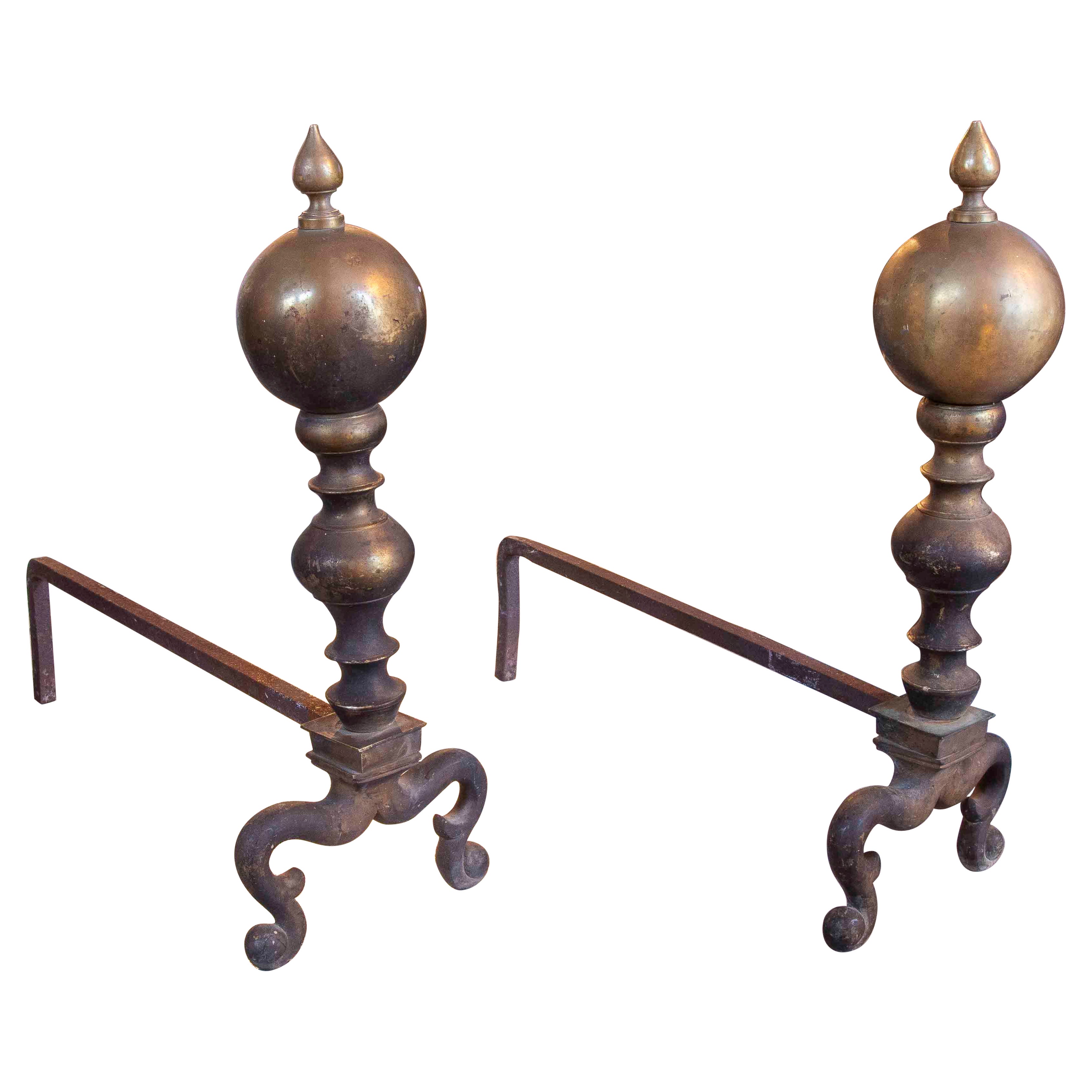 Coppia di androni antichi degli anni 
30 in bronzo tornito con base in ferro