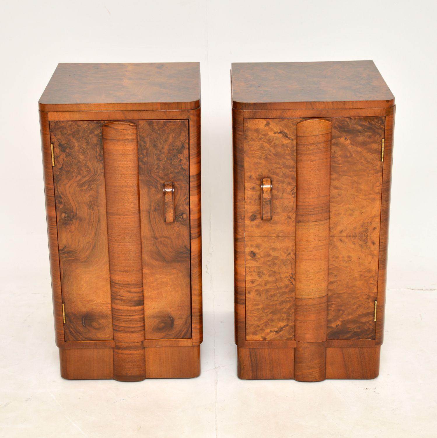 A beautiful pair of original Art Deco period bedside cabinets in Walnut. These were made in England, they date from the 1930’s.

They are of amazing quality, have a beautiful design and are a very useful size. The door fronts have a lovely moulded