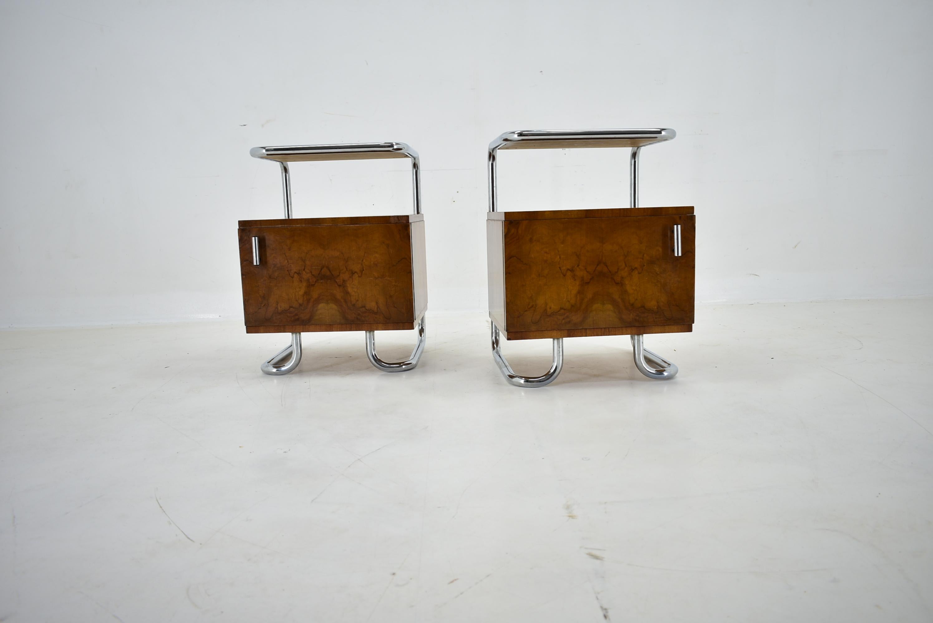 Set of two Bauhaus bedside tables made by Mucke-Melder.

Designed  Interior architect Beck Arnošt . He studied at the Prague Technical University and worked as a designer for the company Mucke-Melder.
Chrome plated tubular construction with age