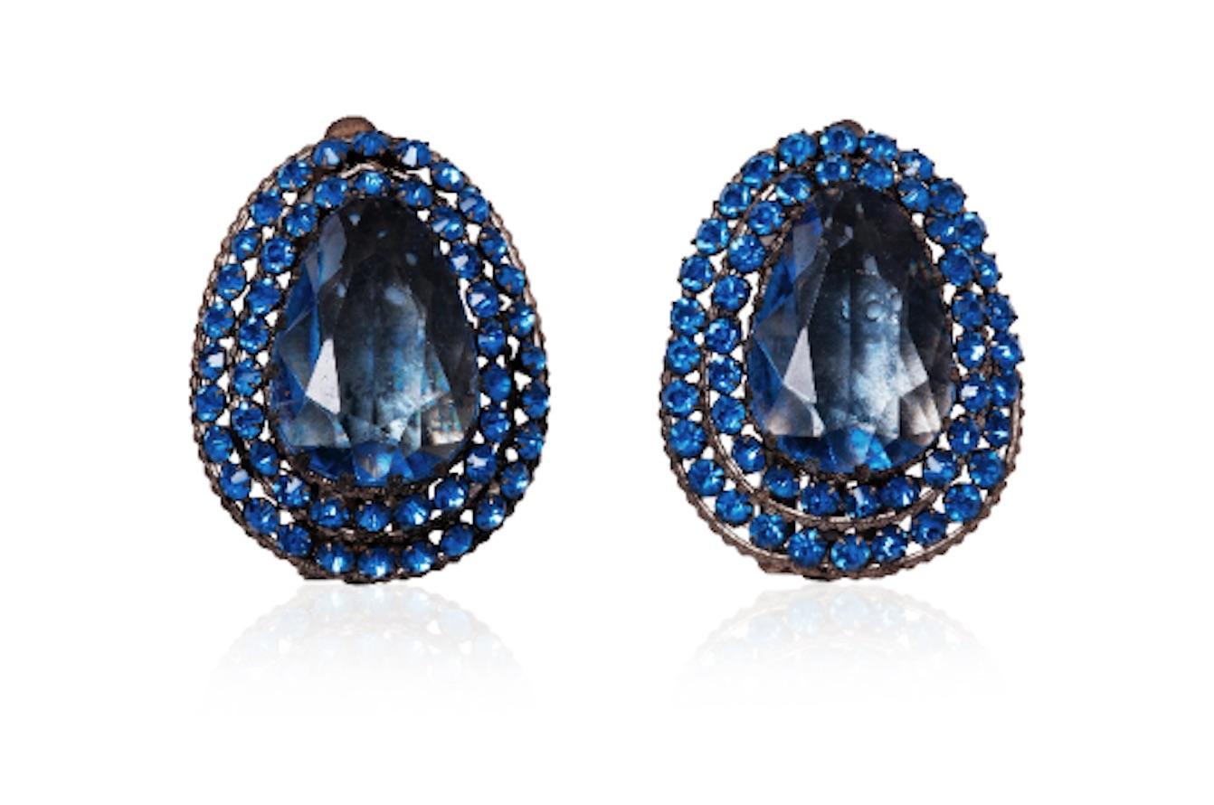 Very large and striking teardrop shaped 1930s blue faceted glass and crystal dress clips made in Czechoslovakia.  These are an elaborate tiered example and it is rare to find such a matched pair in excellent vintage condition with no issues and no