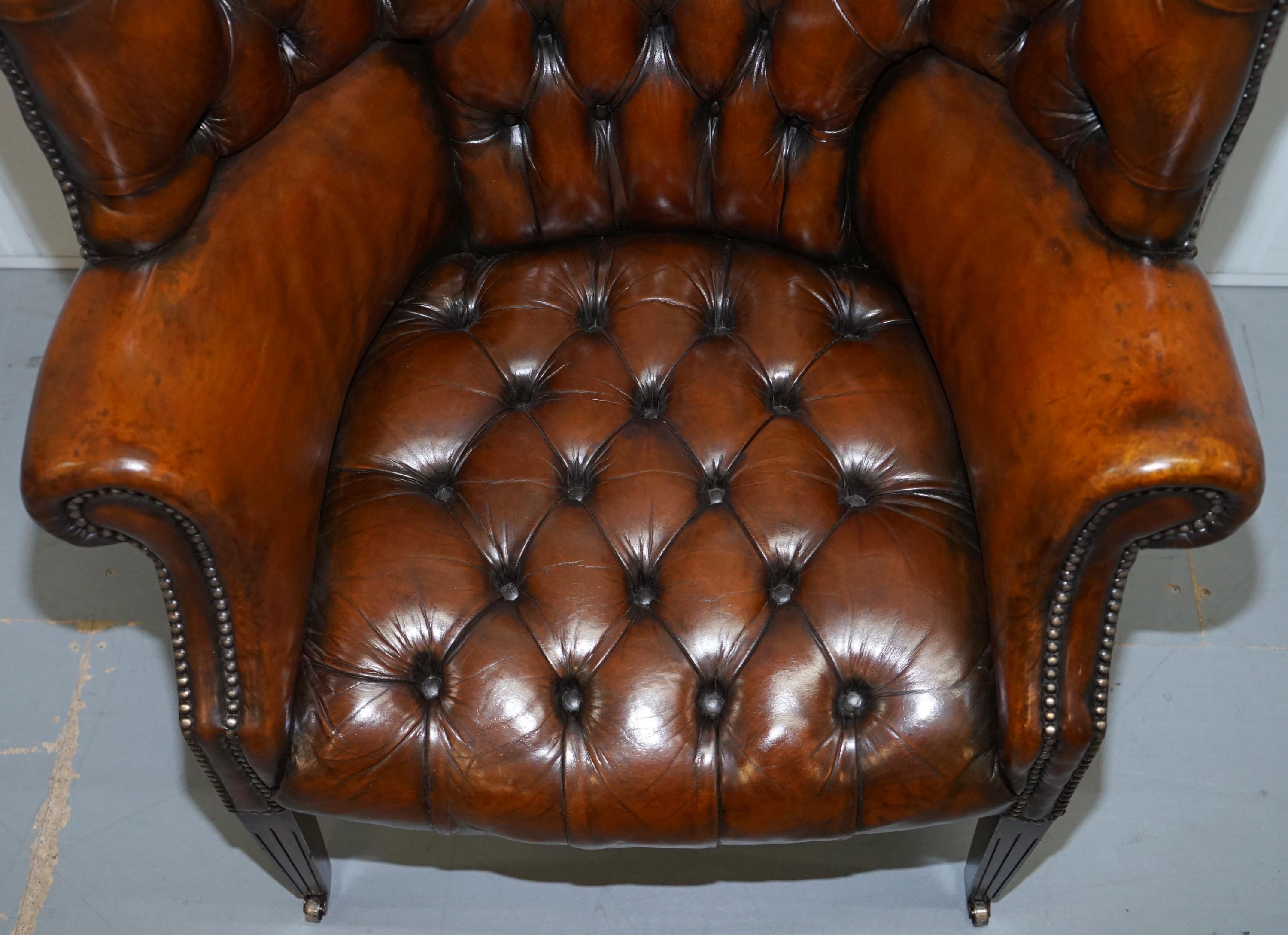 English 1930s Pair of Chesterfield Barrel Back Porters Wingback Armchairs Brown Leather