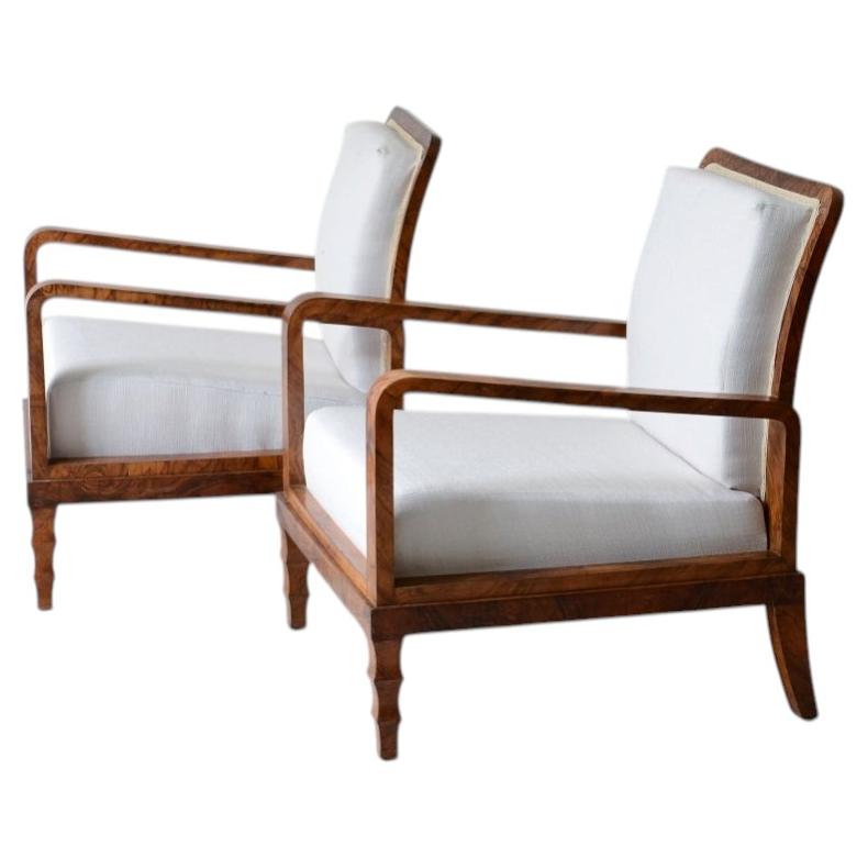 1930's Pair of elegant walnut burl armchairs and matching stools