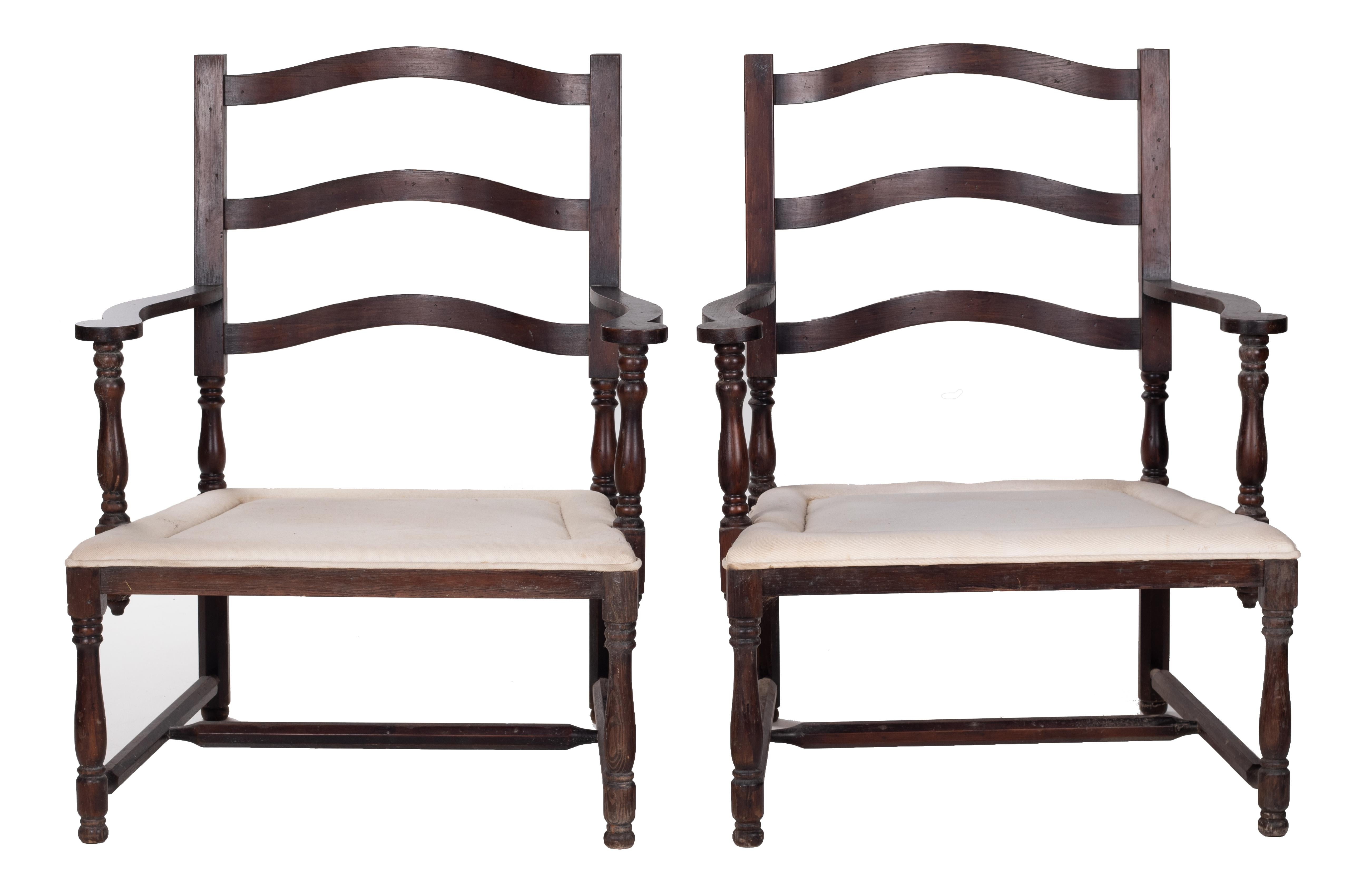 1930s pair of French rustic vintage wooden armchairs.