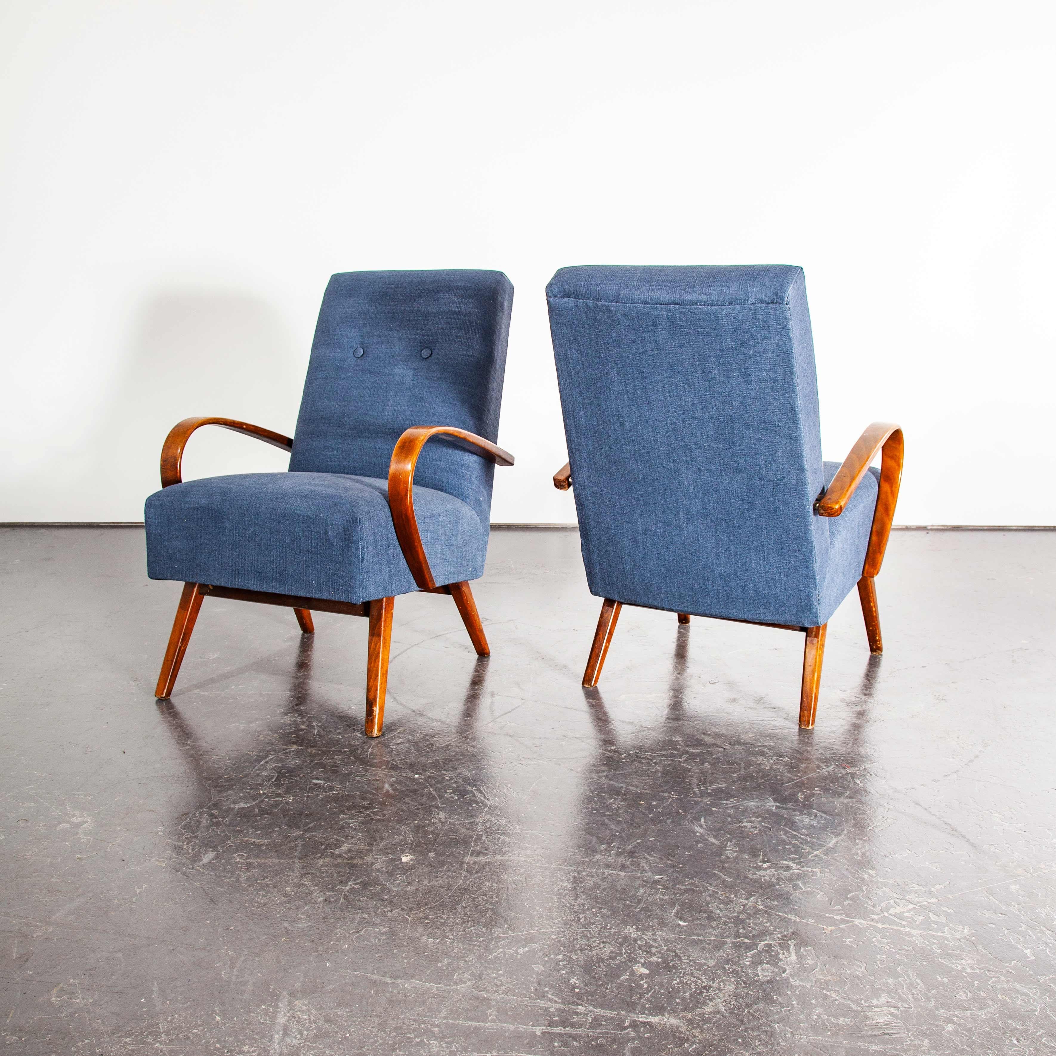 1930s pair of upholstered arm chairs by Jindrich Halabala.
1950s Pair of upholstered armchairs – Jindrich Halabala. Halabala was a Czech industrial designer, writer, and educator. Halabala was a key force in the development of post war industrially
