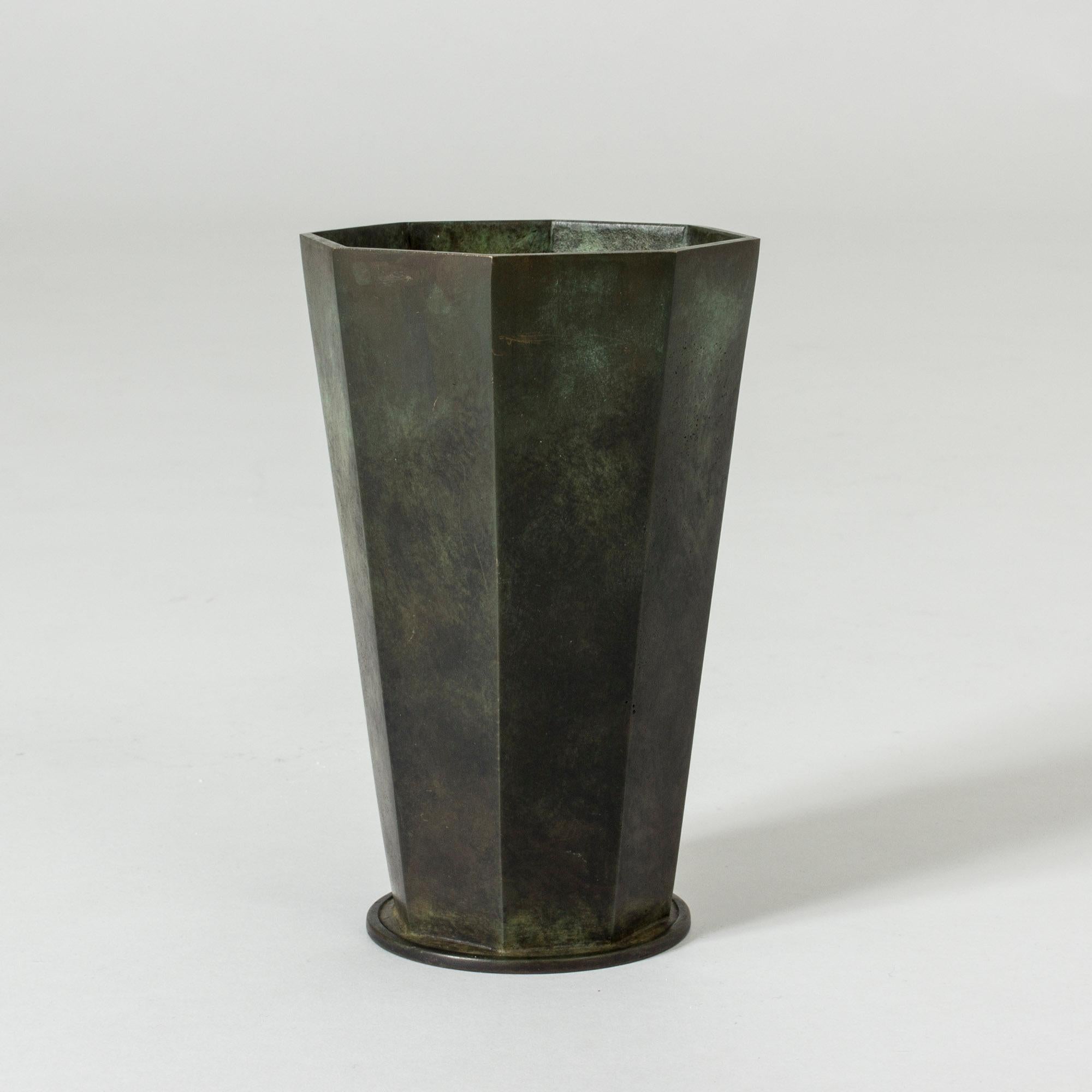 Elegant patinated bronze vase from GAB in a graphic, conical octagon shape. Heavy quality.