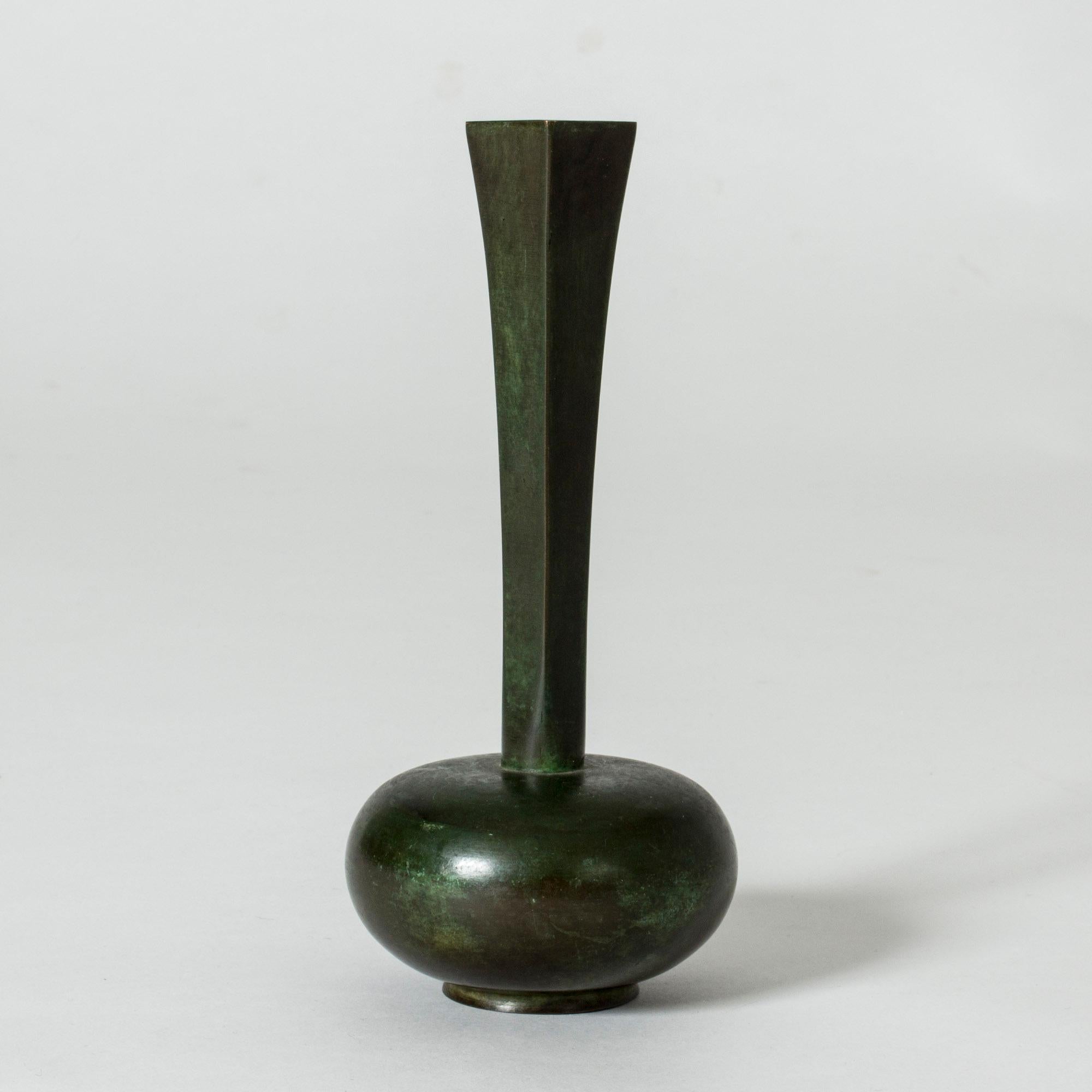 Beautiful bronze vase from GAB, patinated dark green in varying nuances. Plump base contrasted with a slender, tapering neck.
