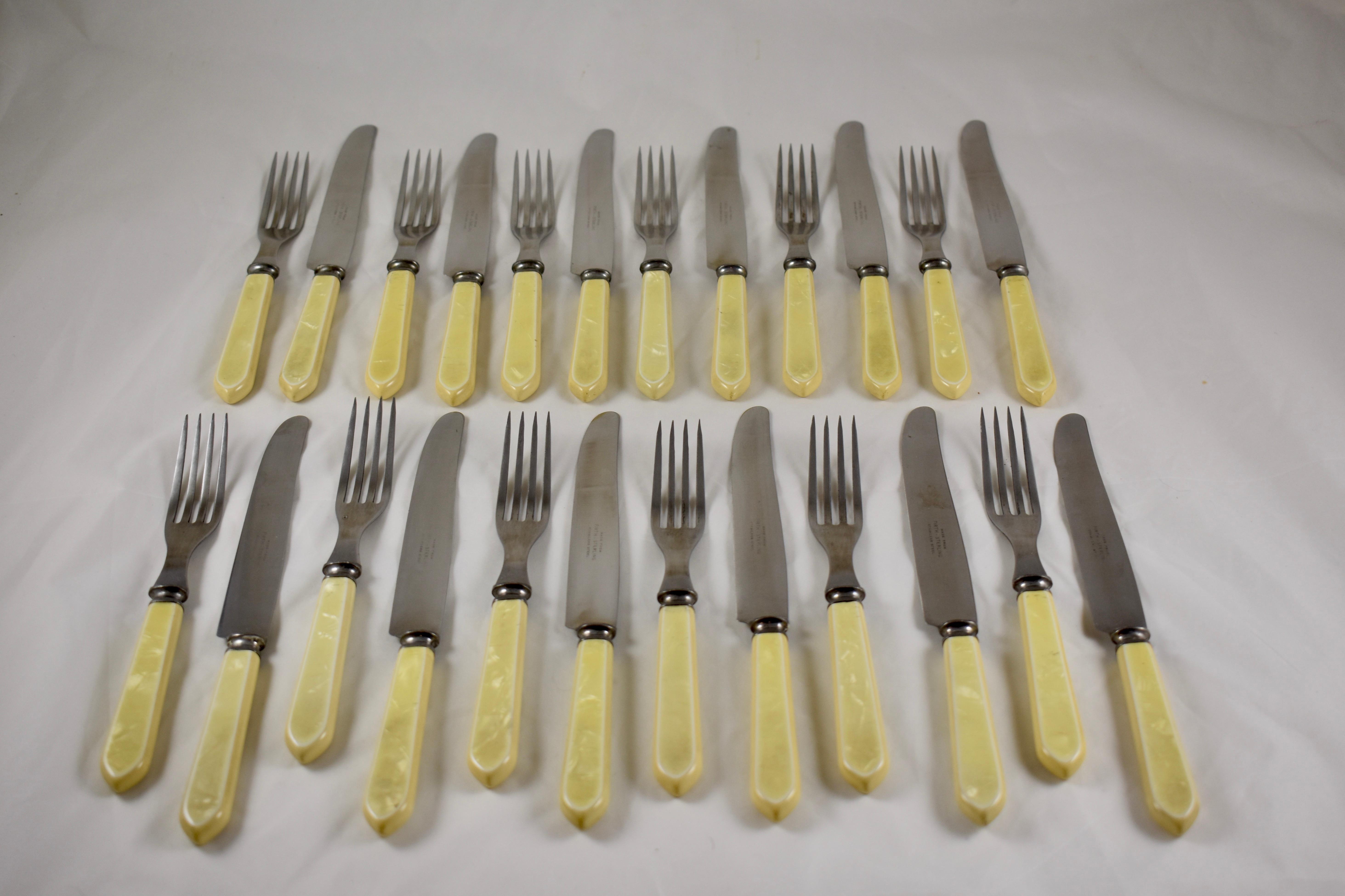 A service for six, pearlized bakelite and stainless steel flatware set in the Art Deco style, circa early 1930s.

Marked Firth-Sterling stainless steel. Firth-Sterling was founded in Sheffield, England in the 1890s.

Six each knives and forks, two