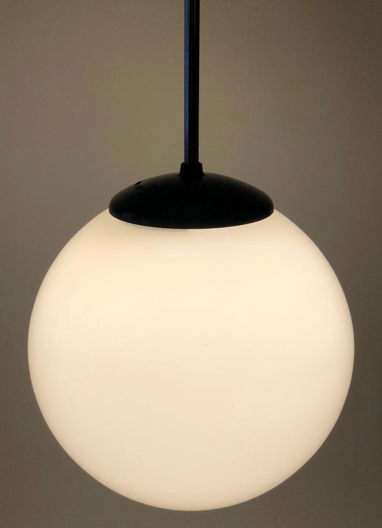 1930s Pendant Light with Round Opaline Glass Shade and Bakelite Elements In Good Condition For Sale In Vienna, Austria