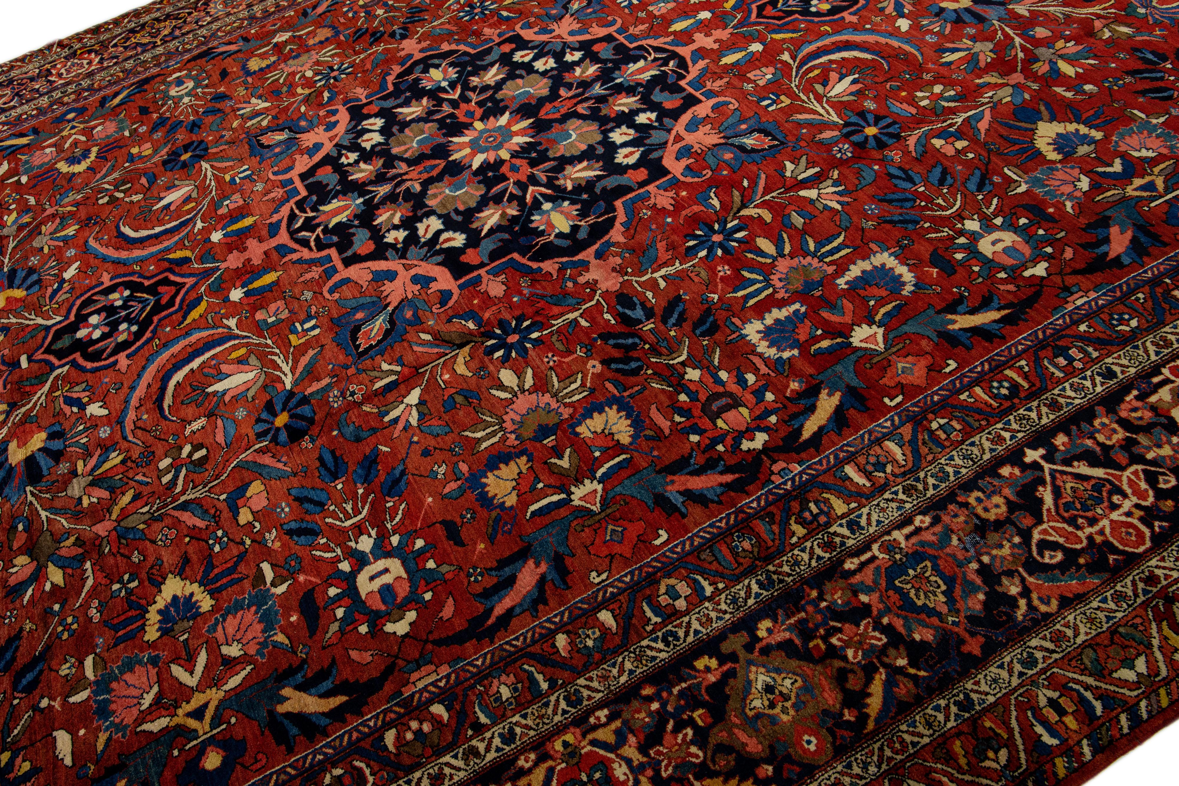 Islamic 1930s Persian Bakhtiari Handmade Wool Rug Rosette Motif in Red For Sale