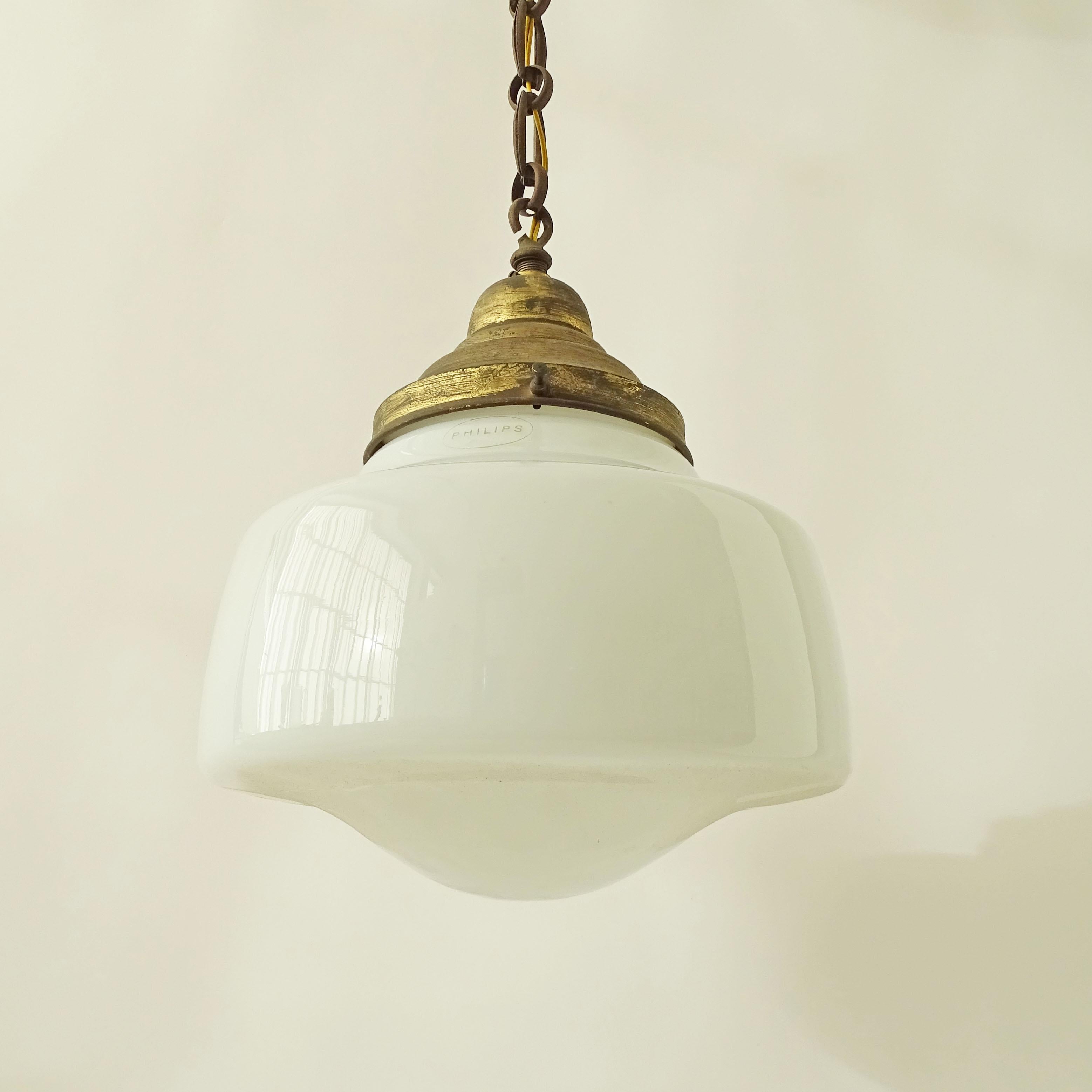 1930s Philips opaline glass and brass pendant.
These examples were used very often in Italian 1920s / 30s interiors.