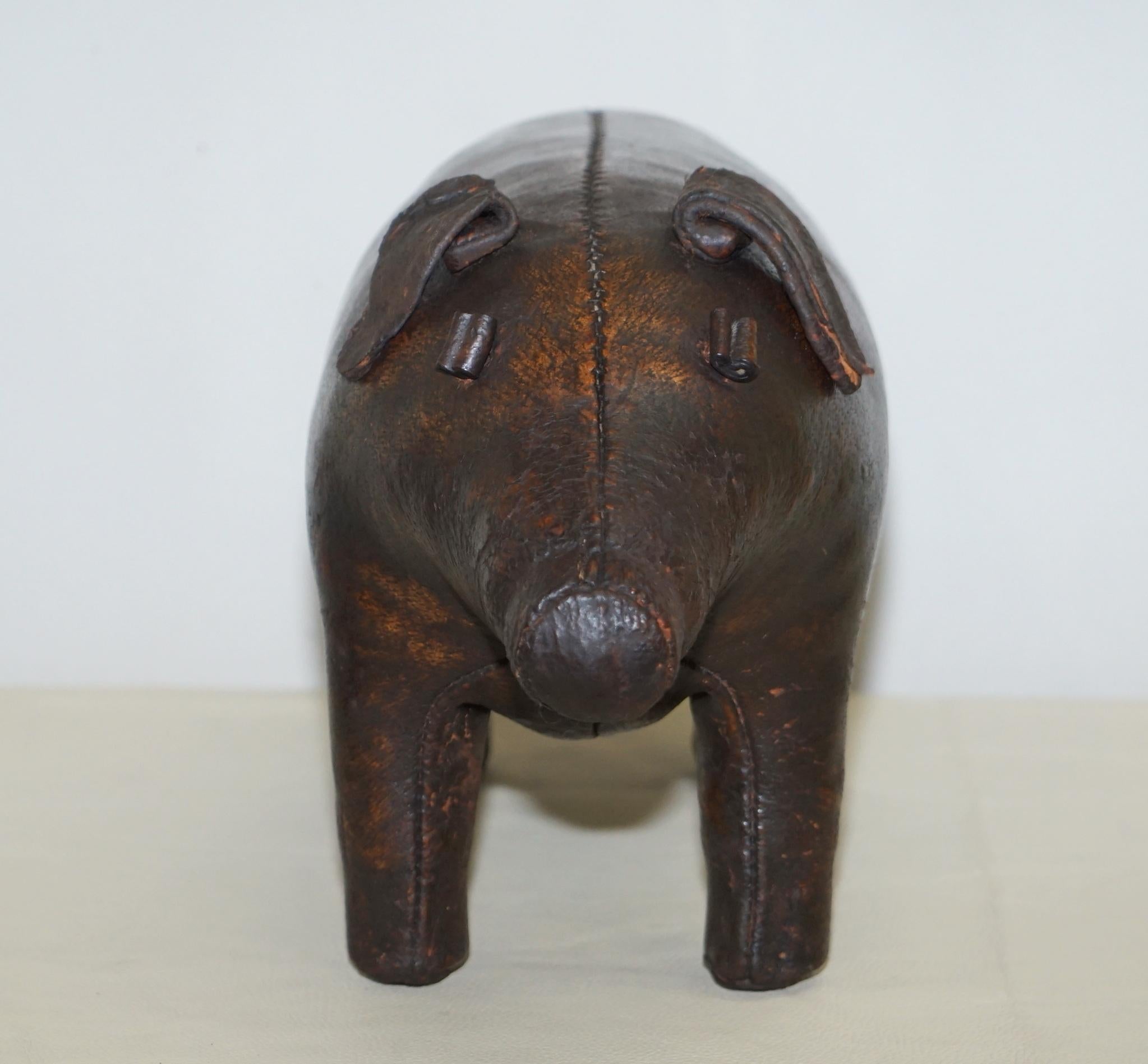 We are delighted to offer for sale this absolutely sublime original 1930s Liberty’s London Omersa brown leather land dyed pig footstool

I have three originals in stock, a Rhino in lovely order circa 1950s, a pig circa 1930s and an Elephant circa