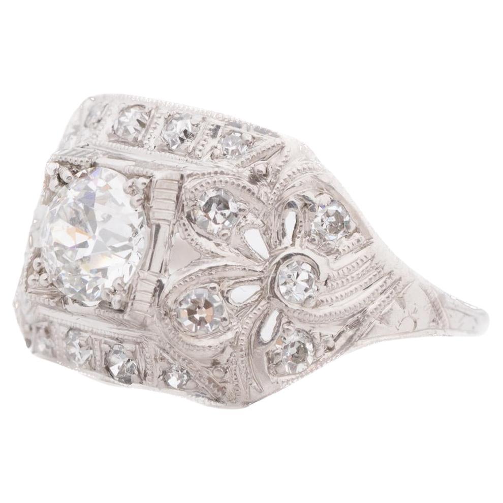 Bague de fiançailles en platine des années 1930 avec un diamant européen brillant de 0,69ct