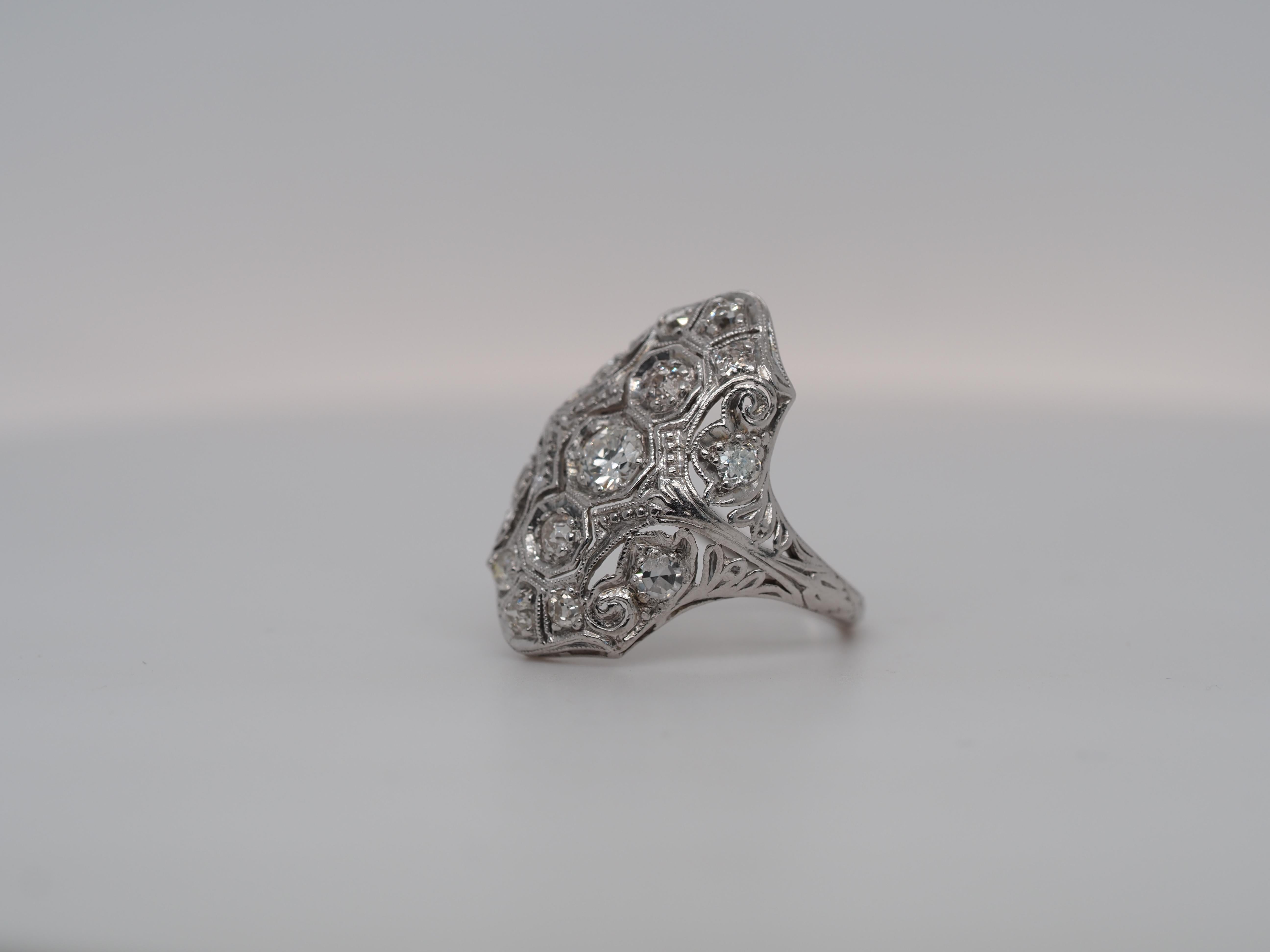 Item Details:
Ring Size: 4.25
Metal Type: Platinum [Hallmarked, and Tested]
Weight: 4.1 grams
Diamond Details: .60ct, total weight, G Color, VS Clarity, Old European Cut Diamonds (natural)
Band Width: 1.5 mm
Condition: Excellent
