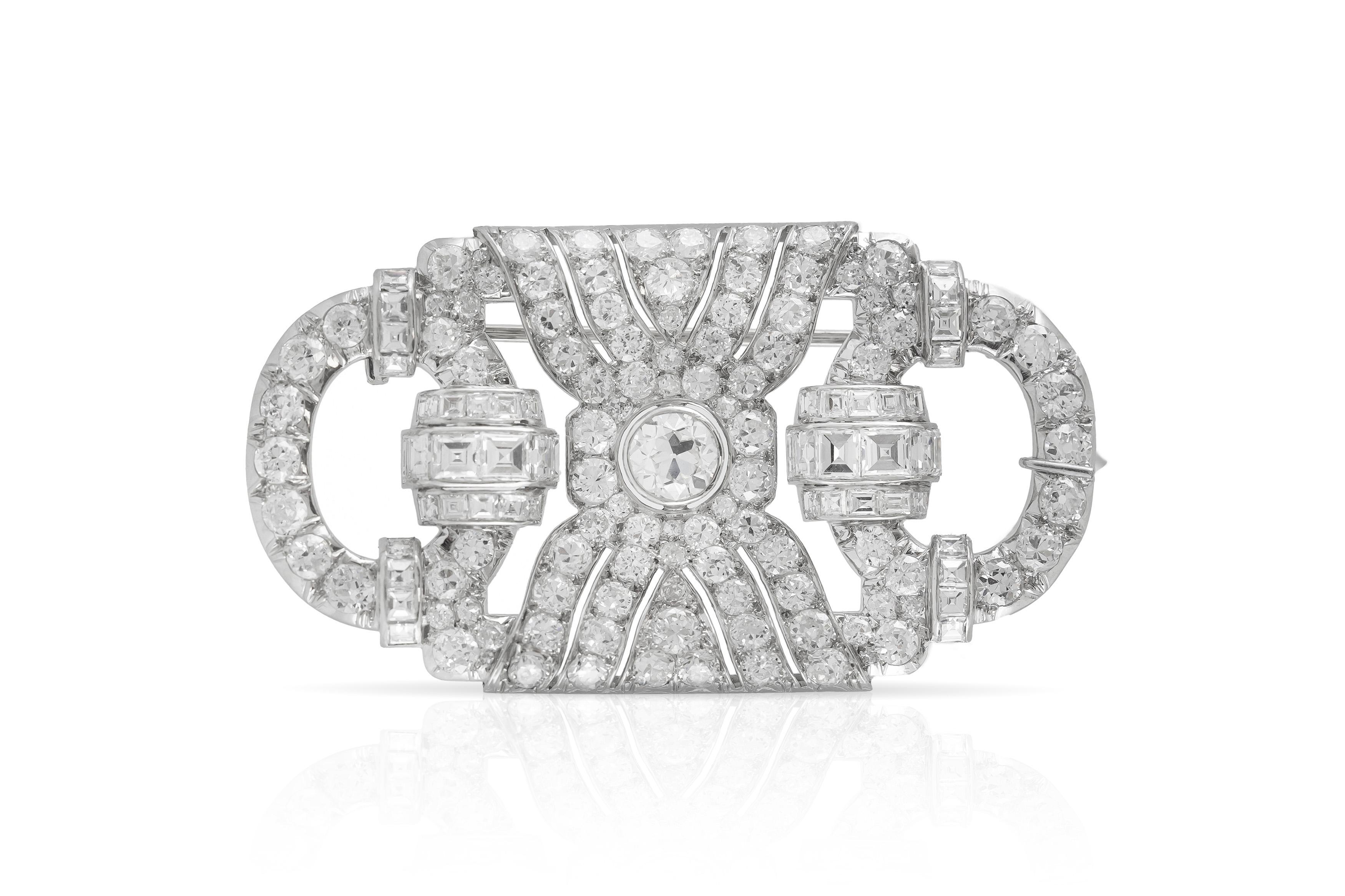 The brooch is finely crafted in platinum with diamonds weighing approximately total of 1.20, 2.00, 3.60 and 8.00 carat.
