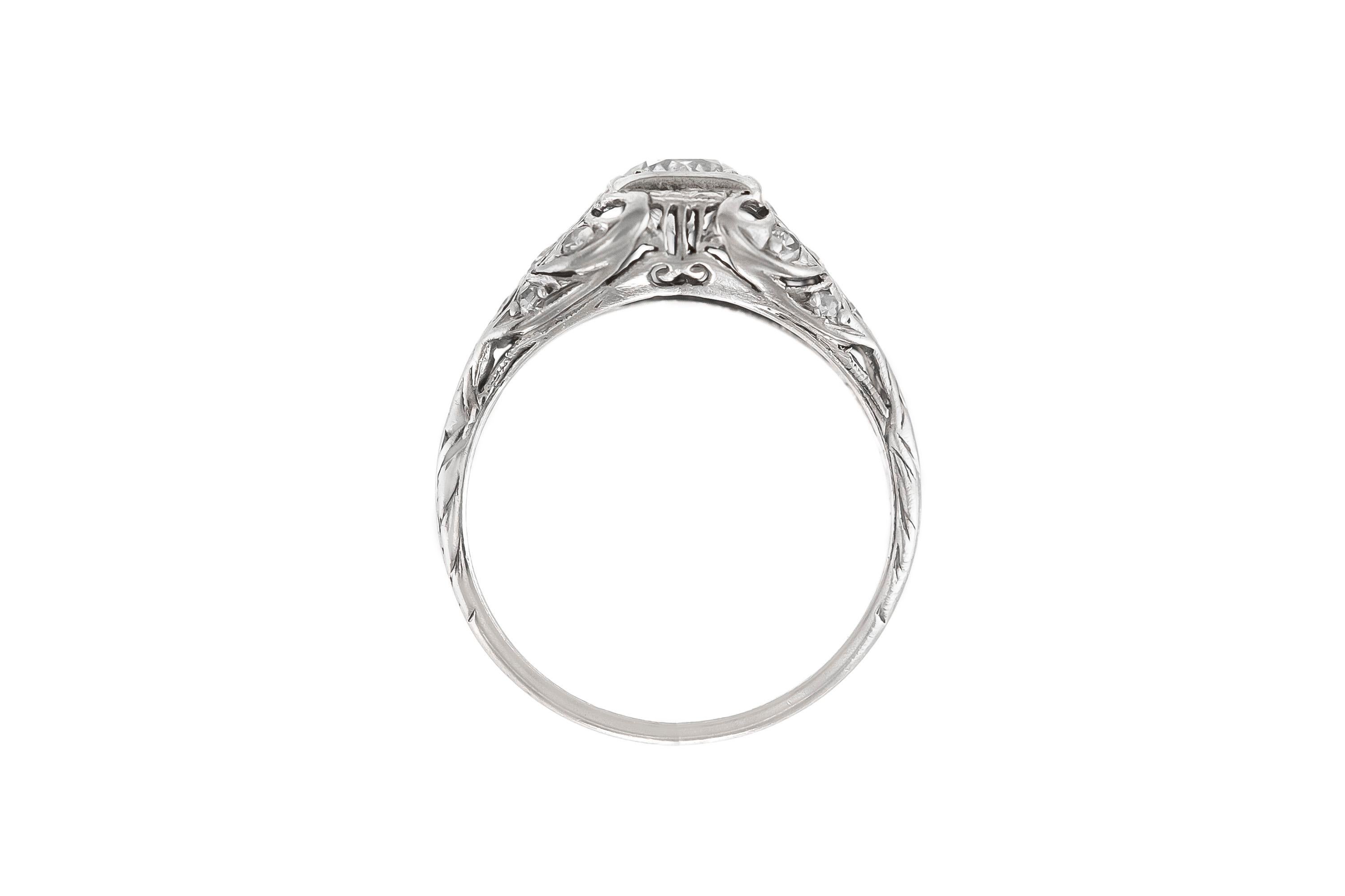 The ring is finely crafted in platinum with center round diamond weighing approximately total of 0.50 carat and around diamonds weighing approximately total of 0.12 carat.
Circa 1930
Easy to resize