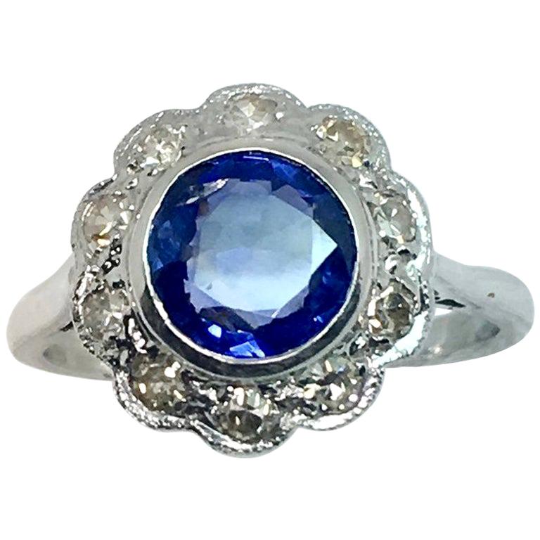 1930s Platinum Round Burma Natural Sapphire and Diamond Cluster Ring For Sale