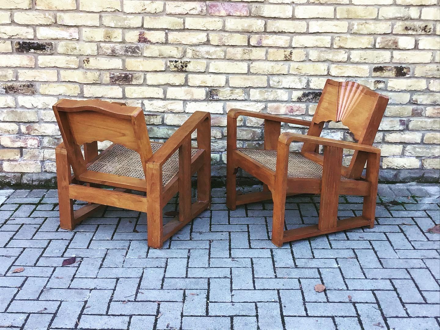Gorgeous pair of solid wood armchairs with woven rattan seating simple
Fantastically comfortable. With a wonderful sunburst back.

     