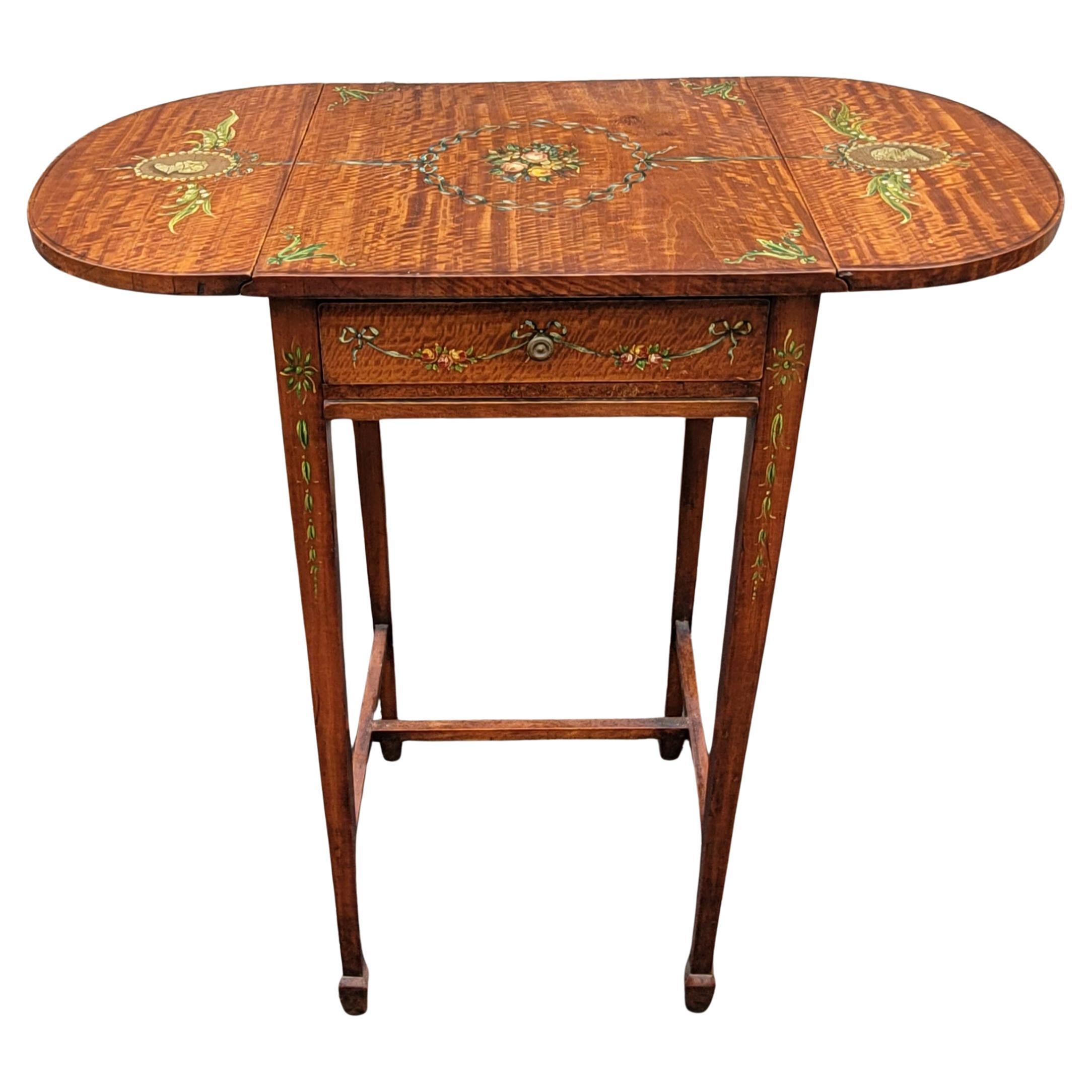 Incroyablement  Refinished  Table Pembroke en forme de goutte d'eau des années 1930 avec un travail de peinture à la main très habile et magnifique. Il fera briller n'importe quelle pièce.
Mesure 26 
