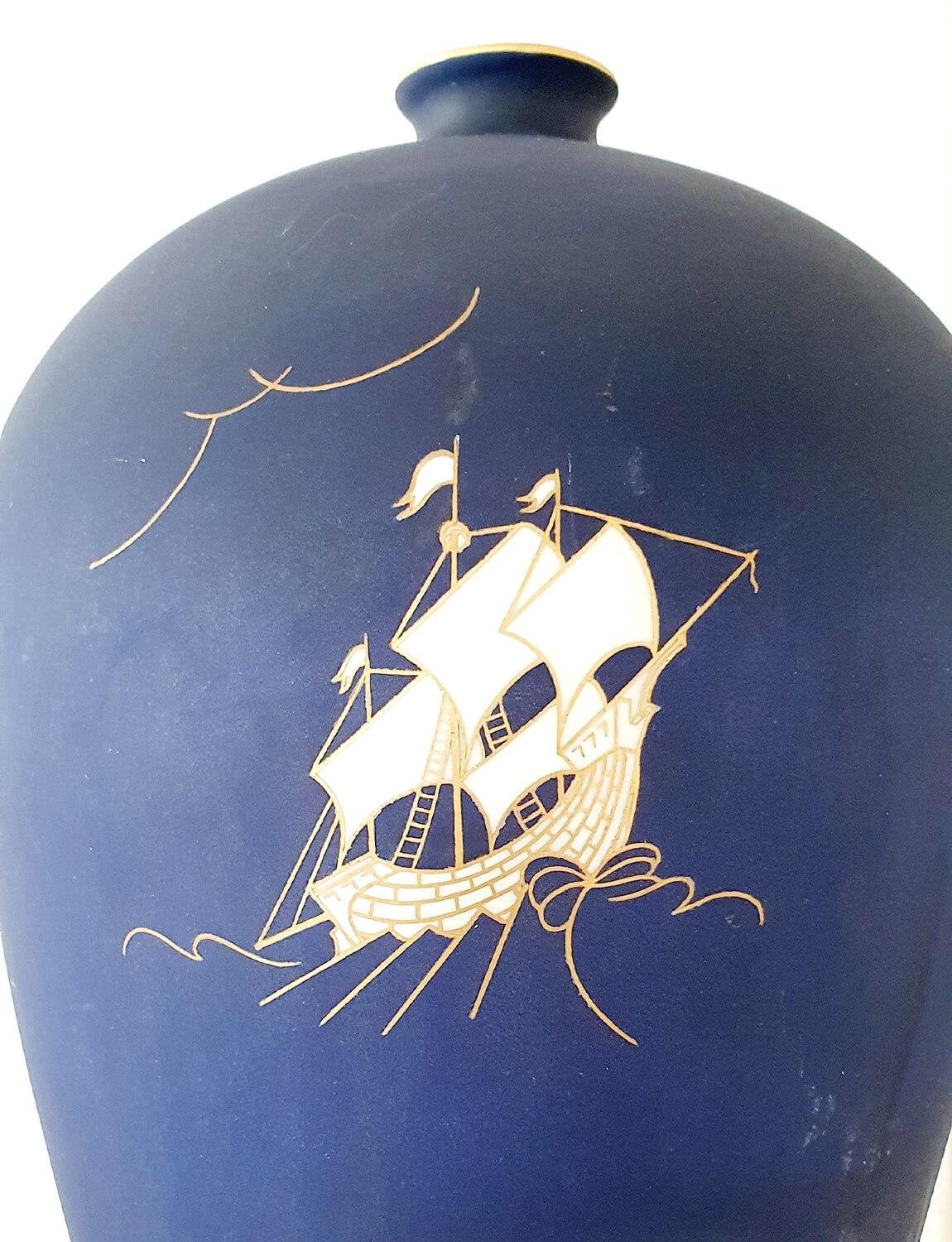 Exceptional large navy matt ceramic vase decorated with a hand-painted ship in gold and white and finished with a gold rim at the top. Signed and stamped Richard Ginori Pittoria di Doccia on the base. This vase was created under the direction of the