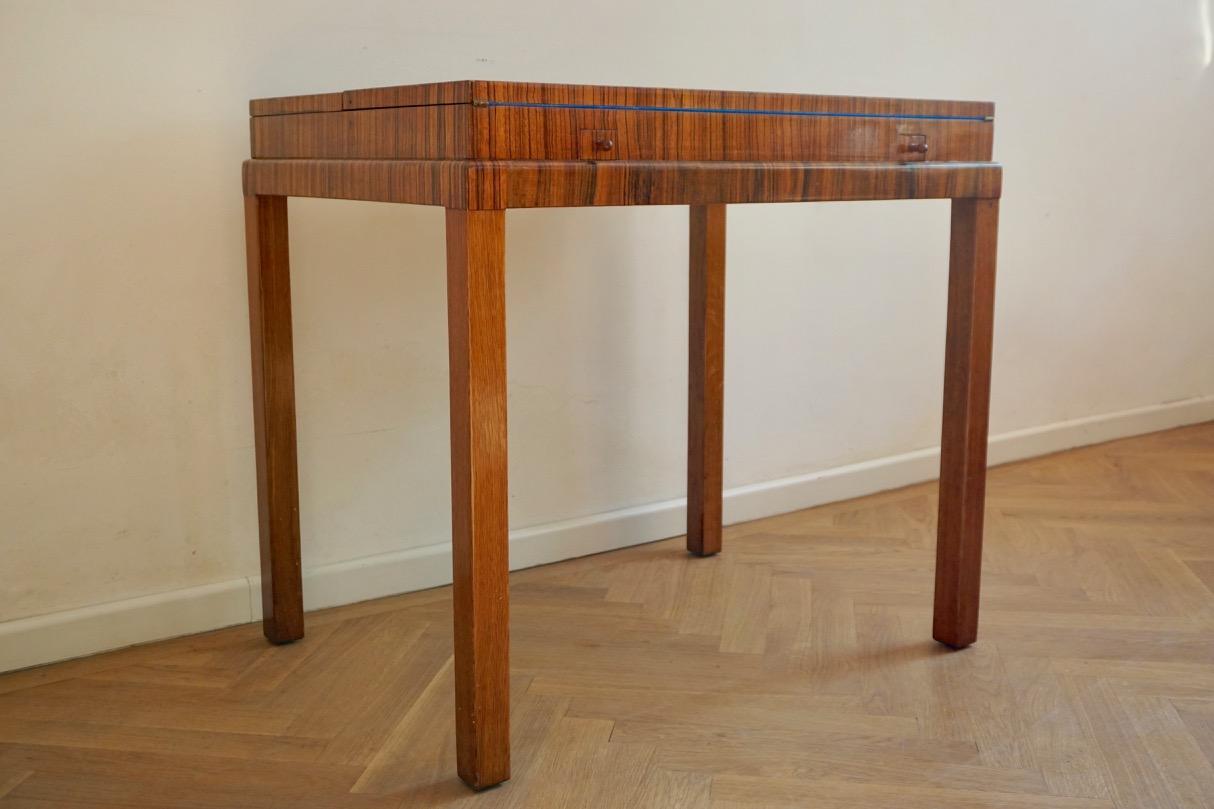 1930s rosewood game table in the style of Lajos Kozma
Beautiful palisander game table from Hungary, in the style of iconic Hungarian designer Lajos Kozma. The table has been restored, only imperfections can be found on the veneered surface.