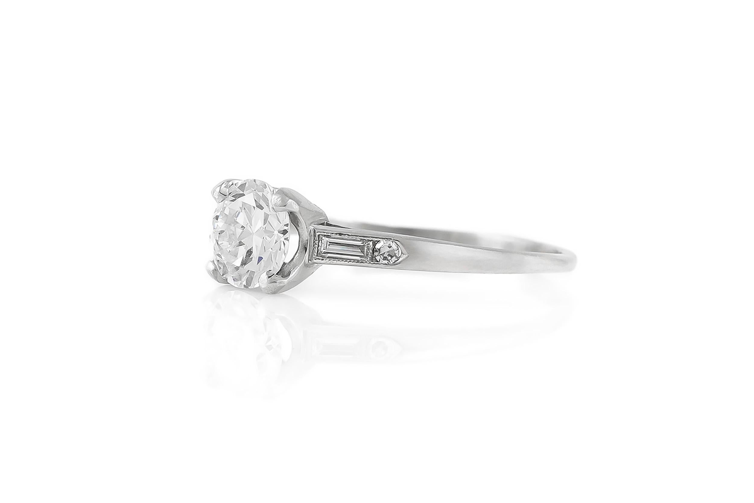 1930s Round Engagement Ring with Two Baguette In Excellent Condition For Sale In New York, NY