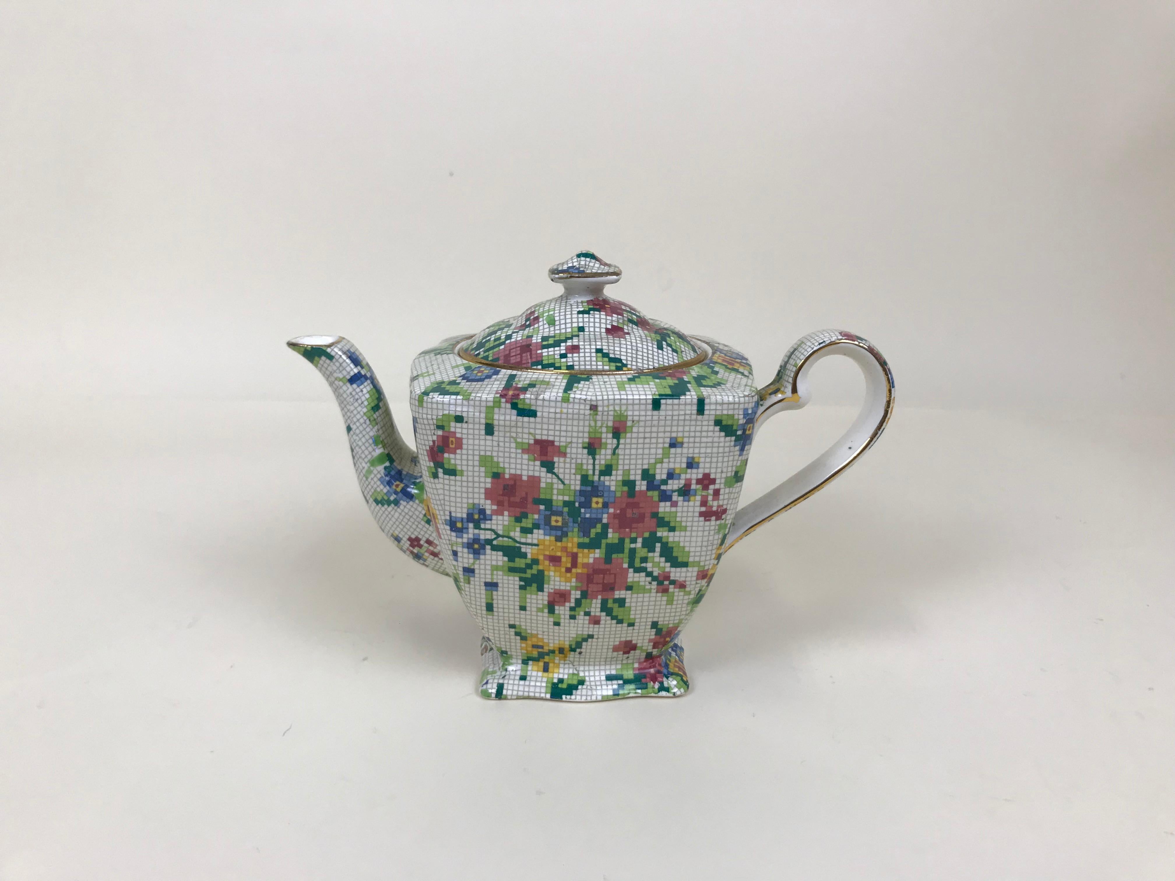 Rare Royal Winton standard squared earthenware teapot, not restored - only a small chip on the bottom edge - and ready to be used. The Queen Anne (1936) needlepoint pattern is part of the famed Chintz collection by Royal Winton. It consist of