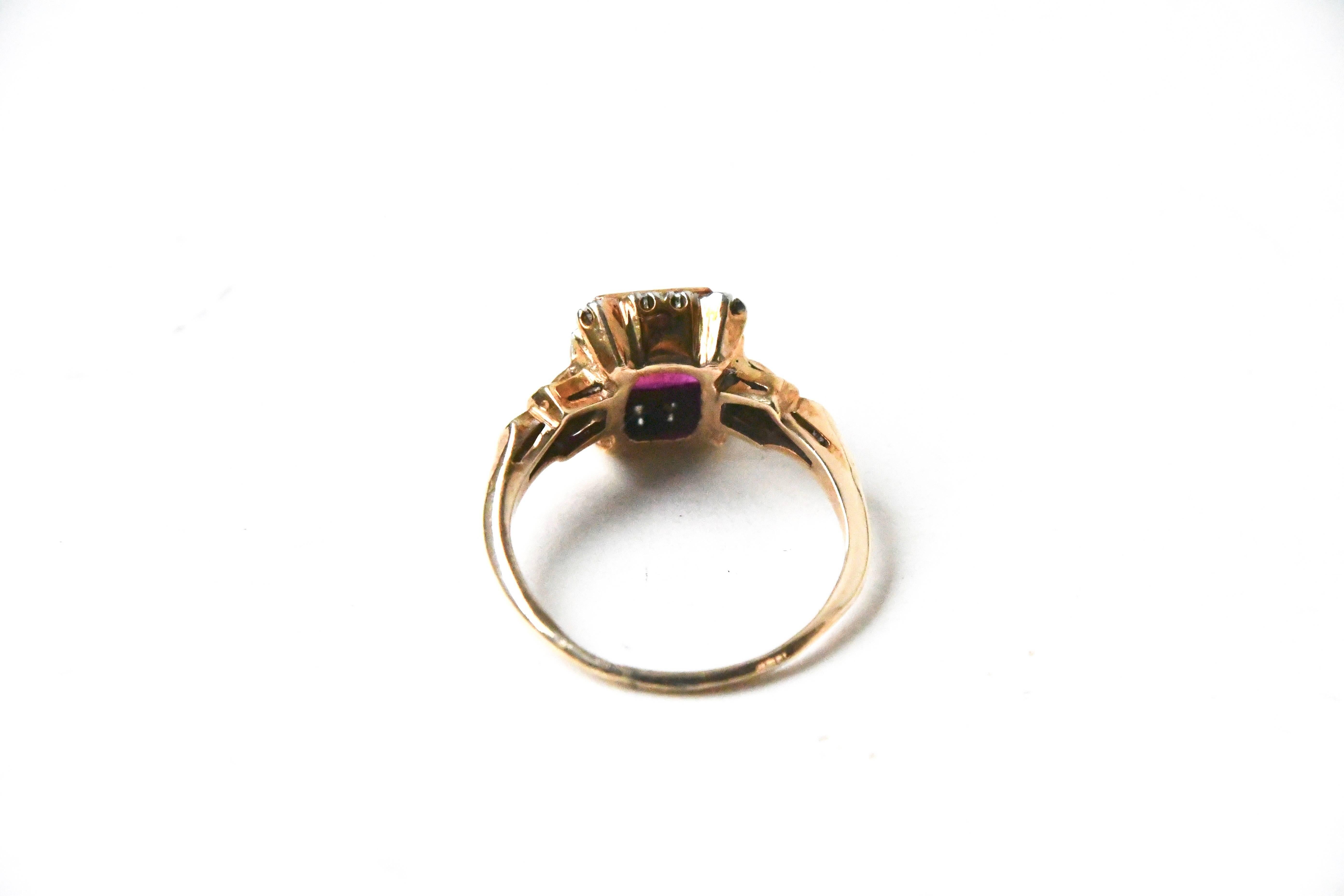 Art Deco synthetic ruby ring with diamonds and 14k gold buckle details.  Reviewed by a gemologist.  Size 8 currently. 