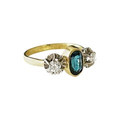 Vintage 1930s Sapphire and Diamond Platinum 18k Yellow Gold Three-Stone Engagement Ring