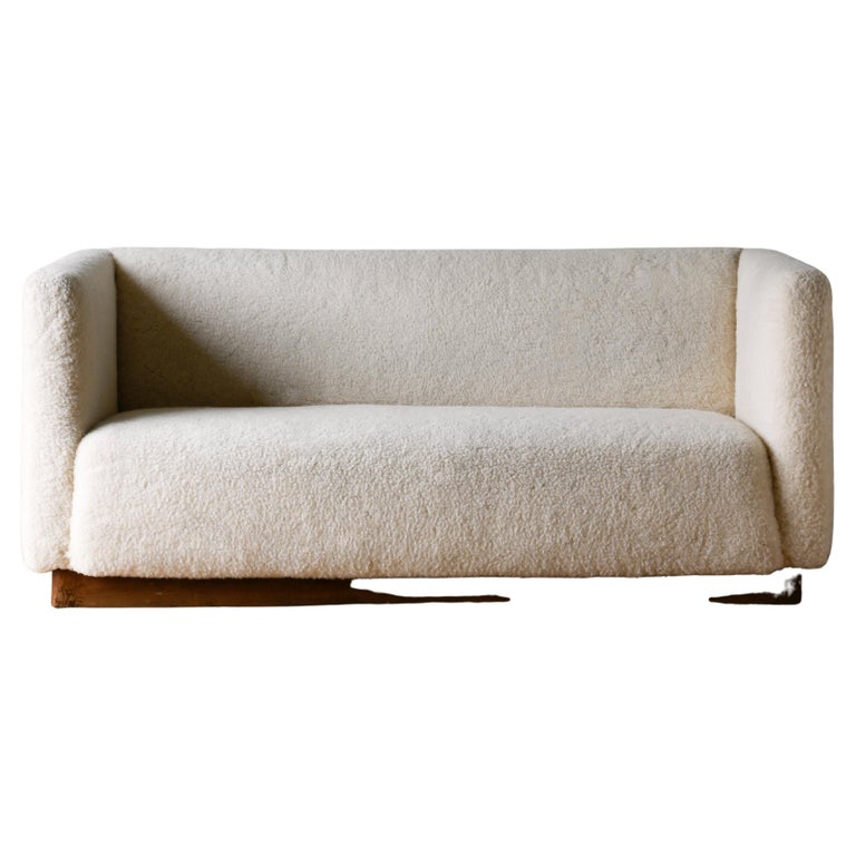 Good proportioned Scandinavian Art Deco sofa recently upholstered in plush faux-lambskin. circa 1930-1939, Denmark.