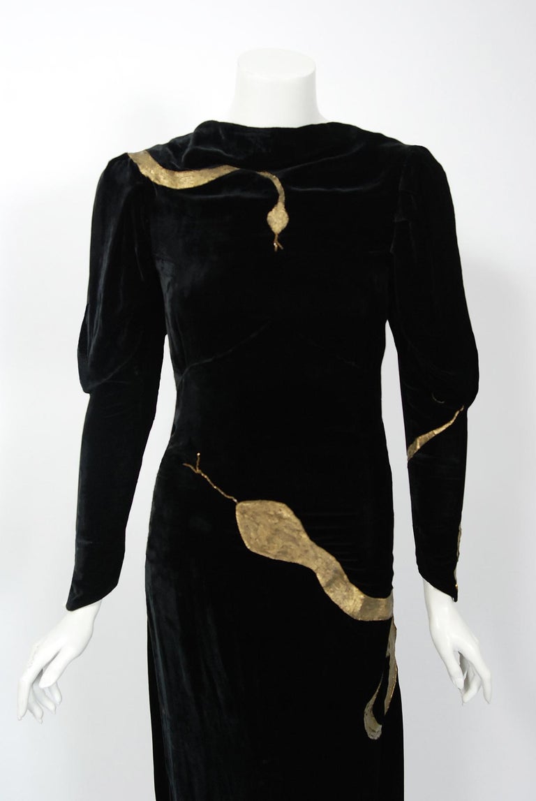 1930's Sears Autographed Fashions Hand-Painted Gold Snake Black Velvet Gown  at 1stDibs | the black velvet gown, black dress with gold snake on back,  gold snake dress
