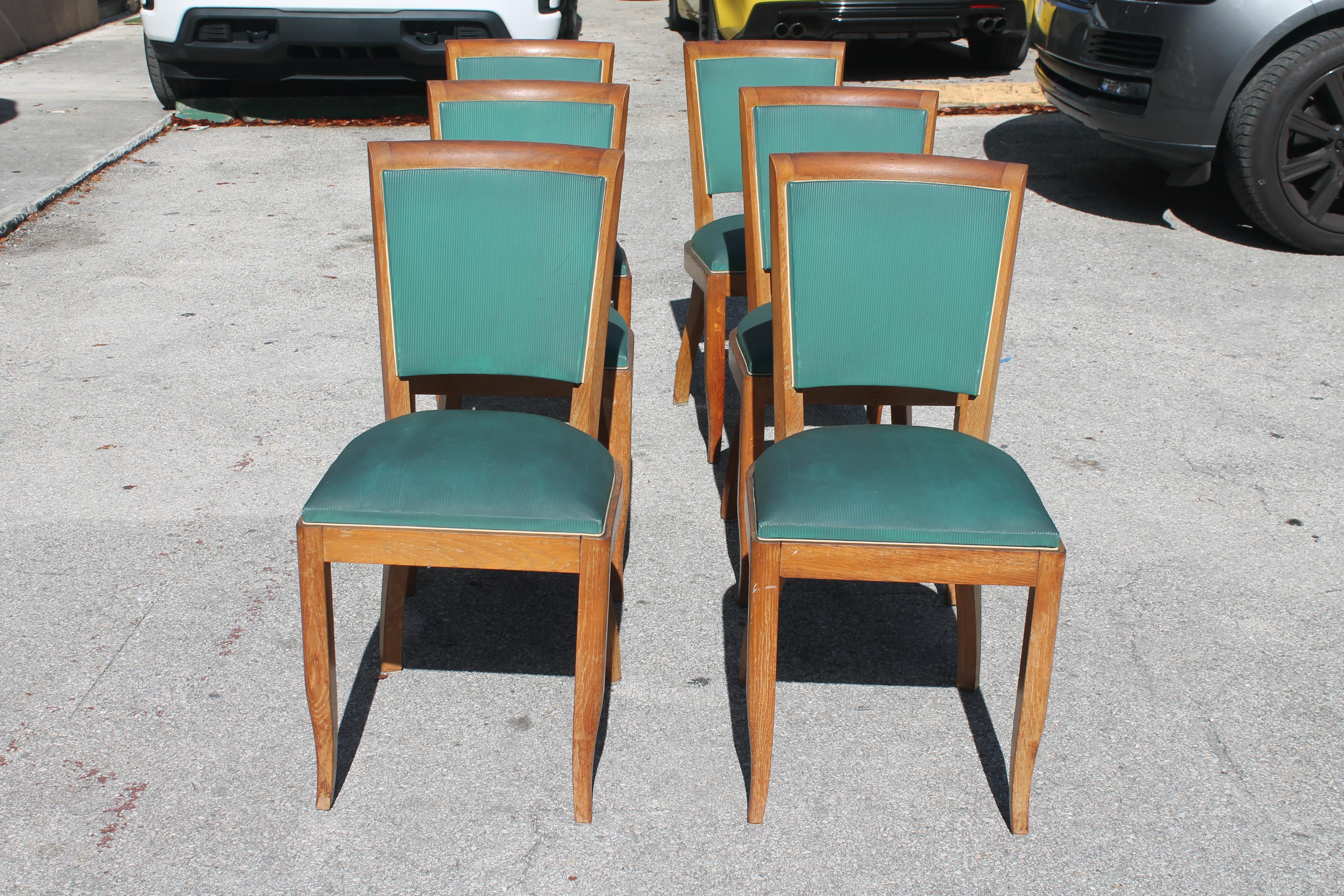 Set of 6 French Art Deco Medium Wood Tone Classic Dining Chairs style Jules Leleu.  Reupholstery recommended on all of our vintage/ Antique furniture. Sturdy frames.