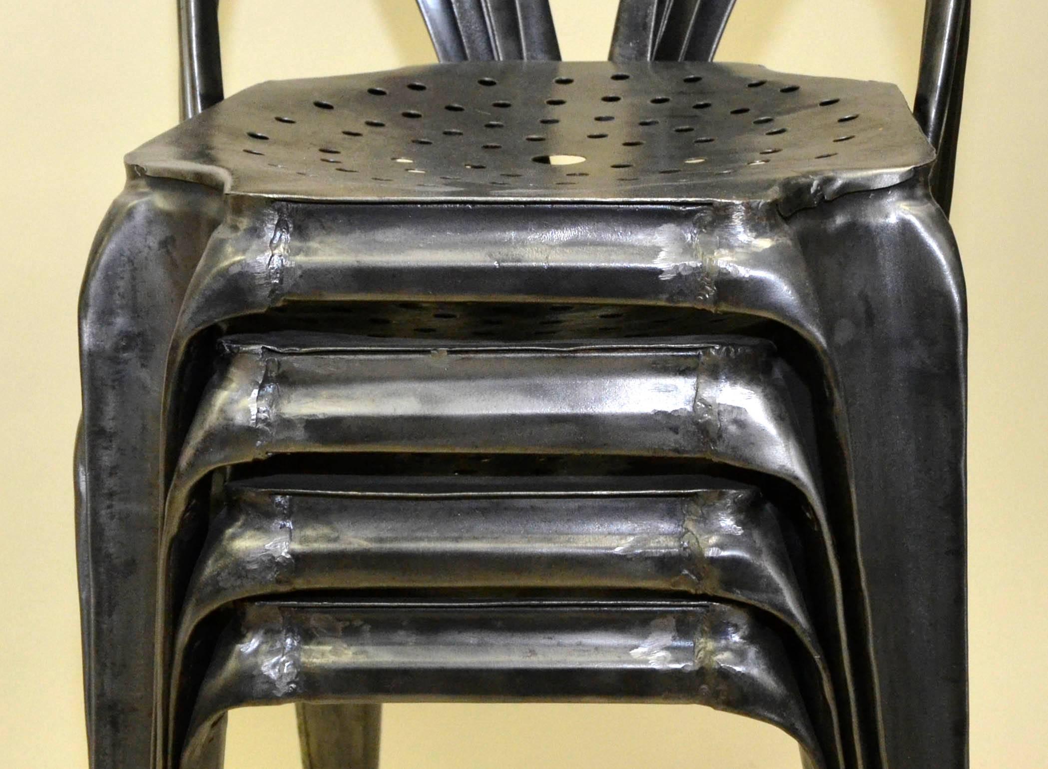 This French style bistro chair was manufactured by Multiples in Lyon and designed by Joseph Mathieu for the first time in 1922.
This Industrial style stripped metal stacking chair was an extraordinarily popular choice among restaurants, cafes in
