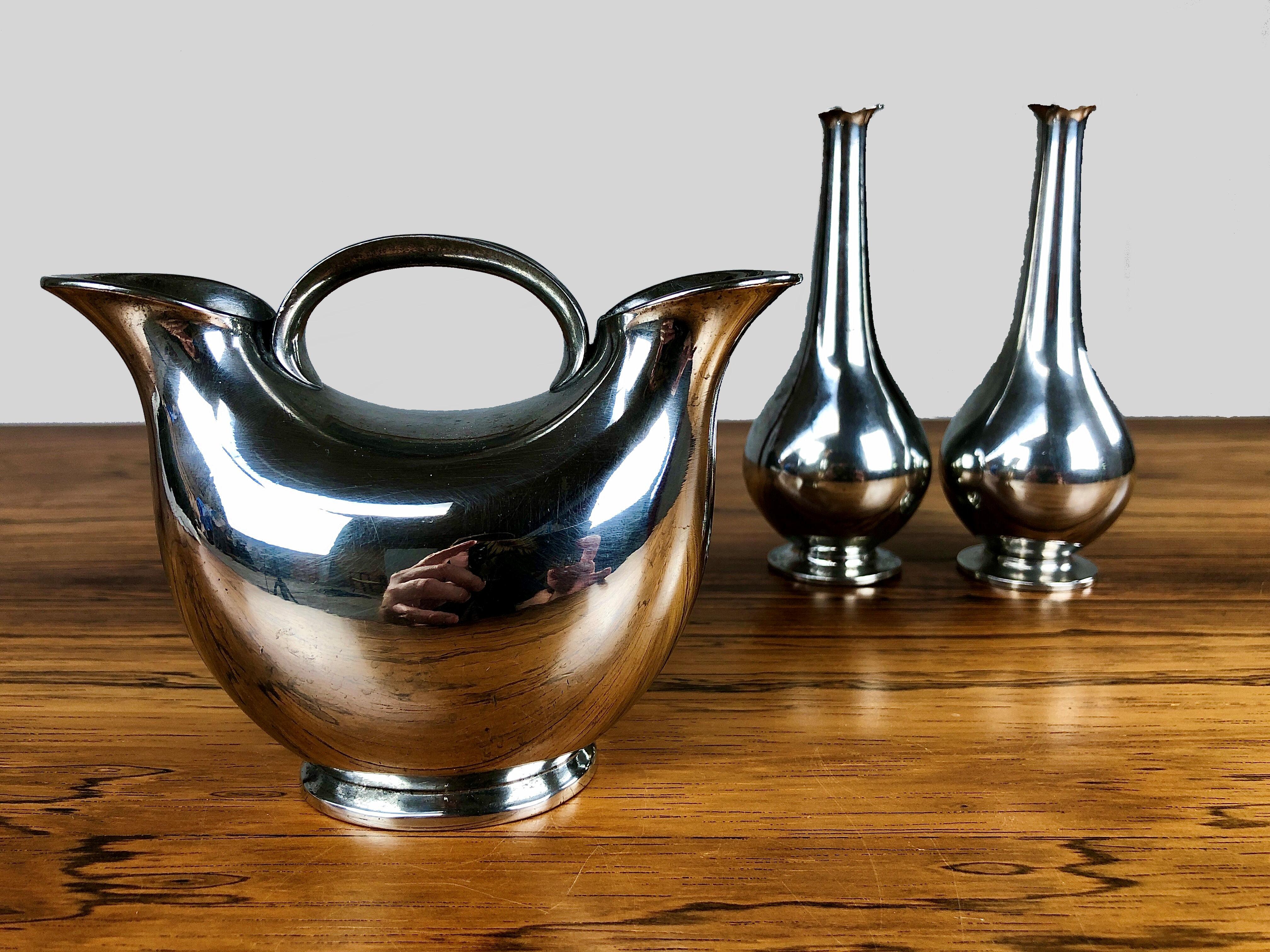 Set of three Danish Just Andersen art deco pewter vases produced by Just Andersen A/S in the 1930´s.

The vases with their simple yet demanding organic shapes are in very good vintage condition and all marked with Just. Andersens triangle mark.