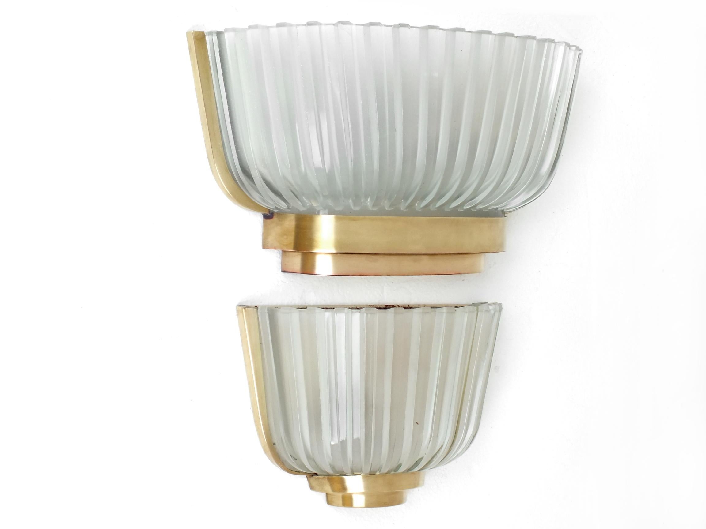 Archimede Seguso two wall lamp crystal pressed and brass, design years '35 / '40.

Two measure for this two wall lamps are; the smaller seguso measures 9