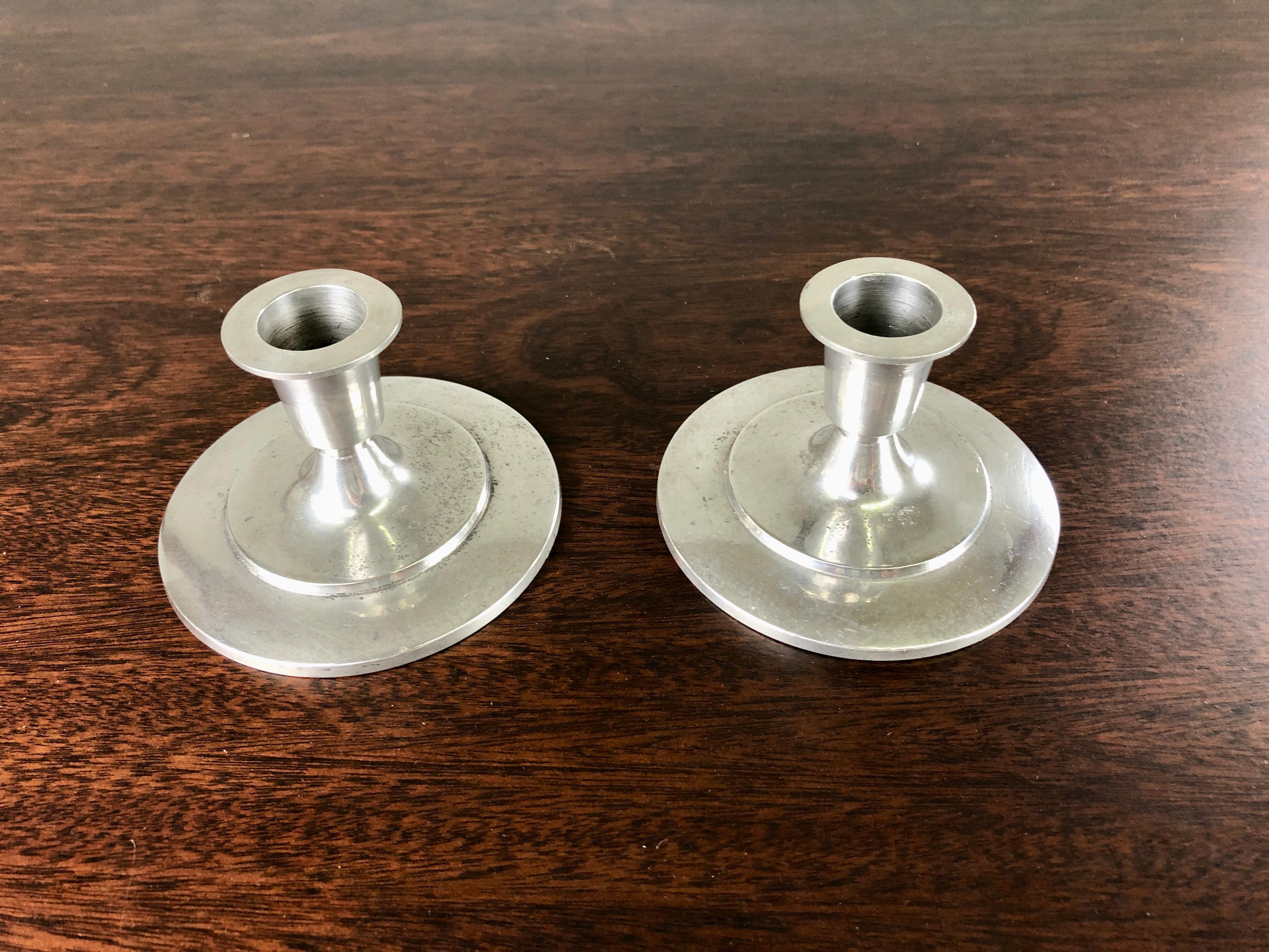 Set of two Danish Just Andersen art deco pewter candlesticks produced by Just Andersen A/S in the 1930´s / 1940´s

The candle holders are in good vintage condition and marked with Just. Andersens triangle mark. 

Just Andersen 1884-1943 was born