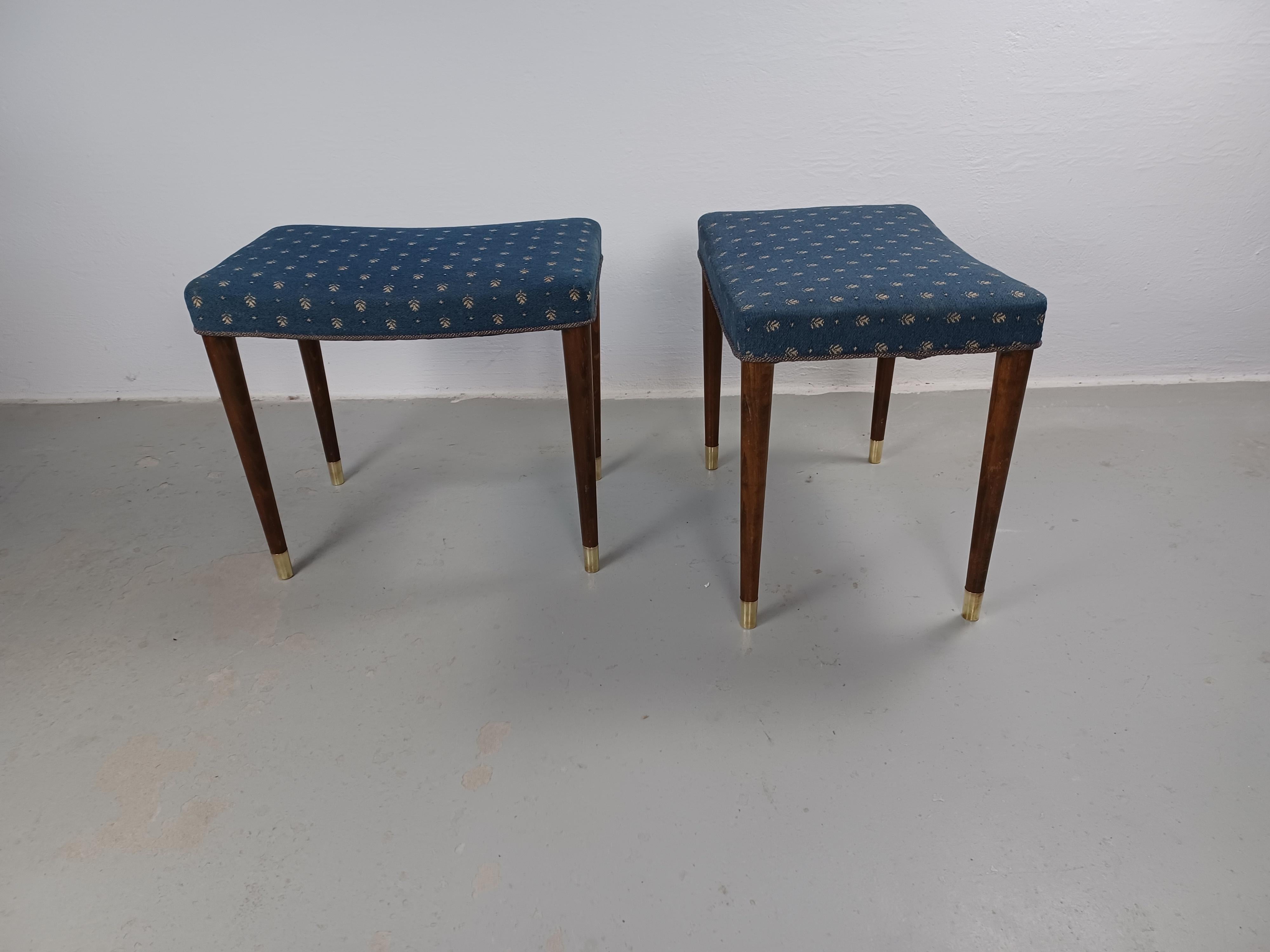 1930s Fully Restored Danish Robert Rasmussen Art Deco Stools or Footstools 

Rare set of two Art Deco stools from the 1920s / 1930s with tanned beech legs, solid brass shoes and original upholstery in almost perfect condirion on a well designed